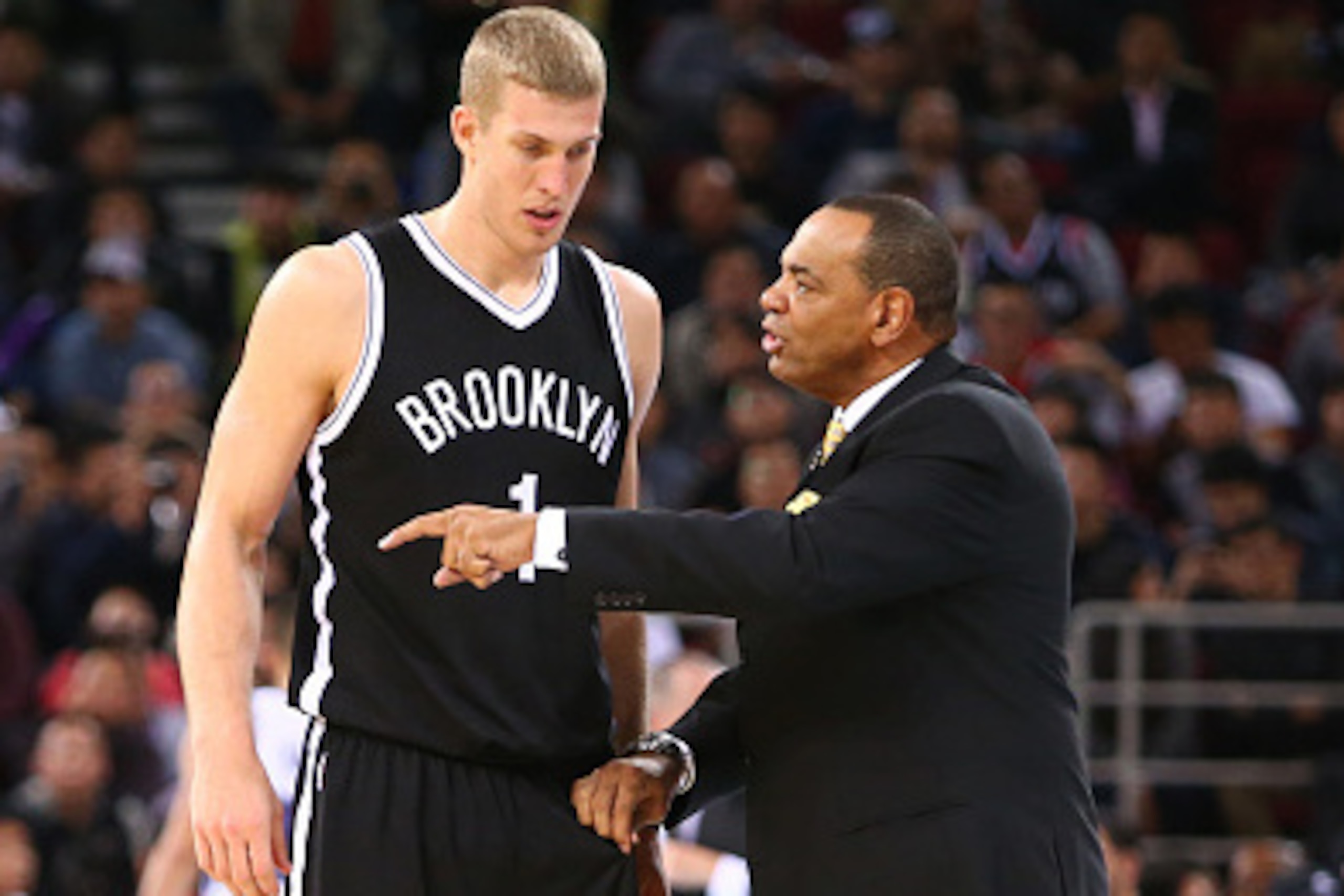 BEIJING, CHINA - OCTOBER 15: Lionel Hollins of the Brooklyn Nets talkes with Mason Plumlee #1 during the game against the Sacramento Kings as part of the 2014 NBA Global Games at the MasterCard Center on October 15, 2014 in Beijing, China. NOTE TO USER: U