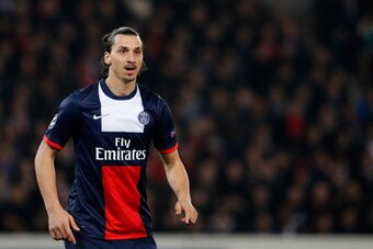 PARIS, FRANCE - MARCH 12:  Zlatan Ibrahimovic of PSG speaks to team mates during the UEFA Champions League Round of 16 second leg match between Paris Saint-Germain FC and Bayer Leverkusen at Parc des Princes on March 12, 2014 in Paris, France.  (Photo by 