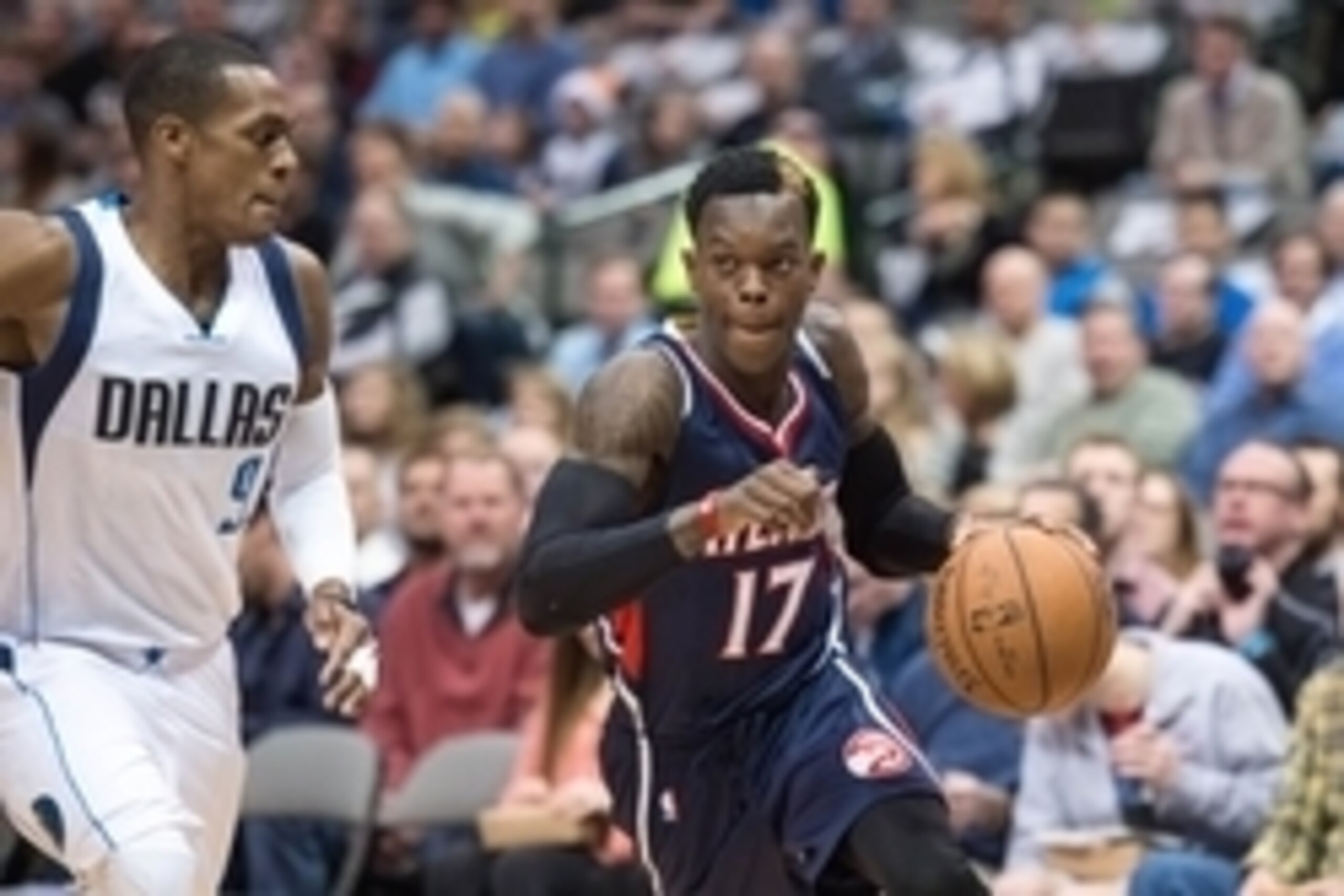Dec 22, 2014; Dallas, TX, USA; Dallas Mavericks guard Rajon Rondo (9) defends against Atlanta Hawks guard Dennis Schroder (17) during the first quarter at the American Airlines Center. Mandatory Credit: Jerome Miron-USA TODAY Sports