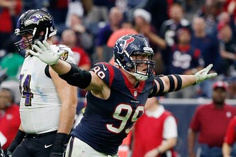 HOUSTON, TX - DECEMBER 21:  J.J. Watt #99 of the Houston Texans celebrates after a sack during their game against the Baltimore Ravens at NRG Stadium on December 21, 2014 in Houston, Texas.  (Photo by Scott Halleran/Getty Images)