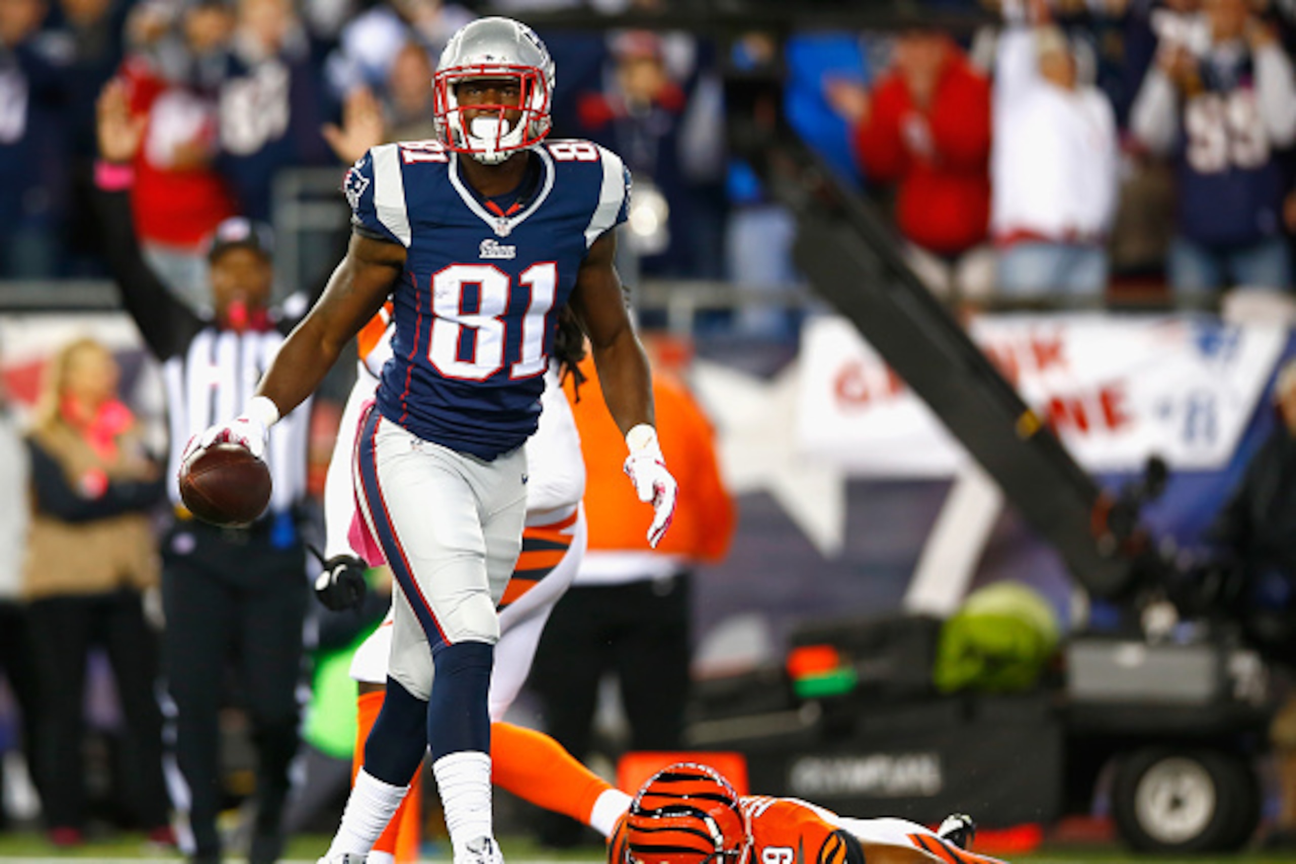 FOXBORO, MA - OCTOBER 05:  Tim Wright #81 of the New England Patriots celebrates after scoring a touchdown during the first quarter against the Cincinnati Bengals at Gillette Stadium on October 5, 2014 in Foxboro, Massachusetts.  (Photo by Jared Wickerham