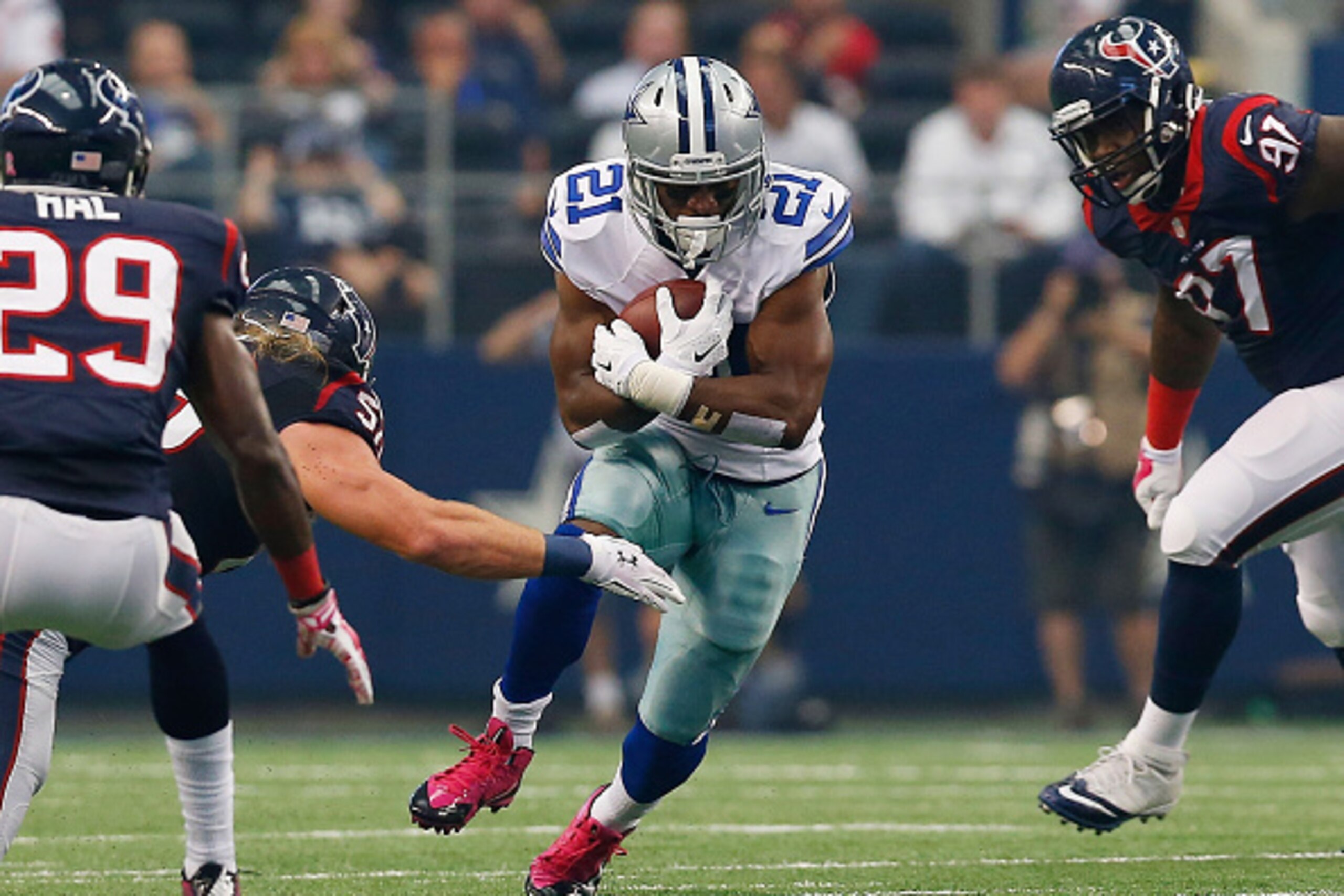 ARLINGTON, TX - OCTOBER 05:  Joseph Randle #21 of the Dallas Cowboys carriers the ball against the Houston Texans in the first half at AT&T Stadium on October 5, 2014 in Arlington, Texas.  (Photo by Tom Pennington/Getty Images)