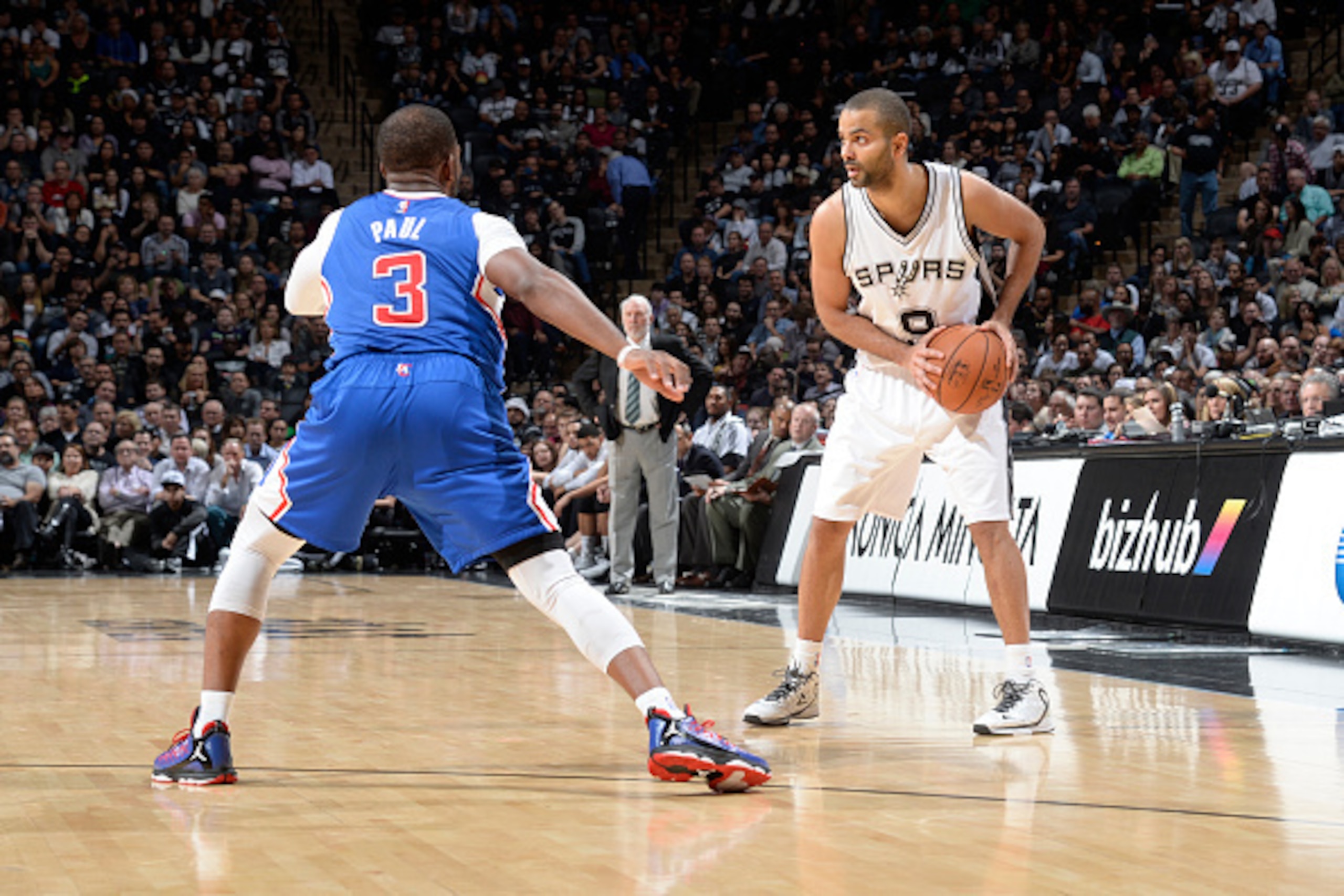 SAN ANTONIO, TX - DECEMBER 22: Tony Parker #9 of the San Antonio Spurs handles the ball against Chris Paul #3 of the Los Angeles Clippers on December 22, 2014 at the AT&T Center in San Antonio, Texas. NOTE TO USER: User expressly acknowledges and agrees SAN ANTONIO, TX - DECEMBER 22: Tony Parker #9 of the San Antonio Spurs handles the ball against Chris Paul #3 of the Los Angeles Clippers on December 22, 2014 at the AT&T Center in San Antonio, Texas. NOTE TO USER: User expressly acknowledges and agrees
