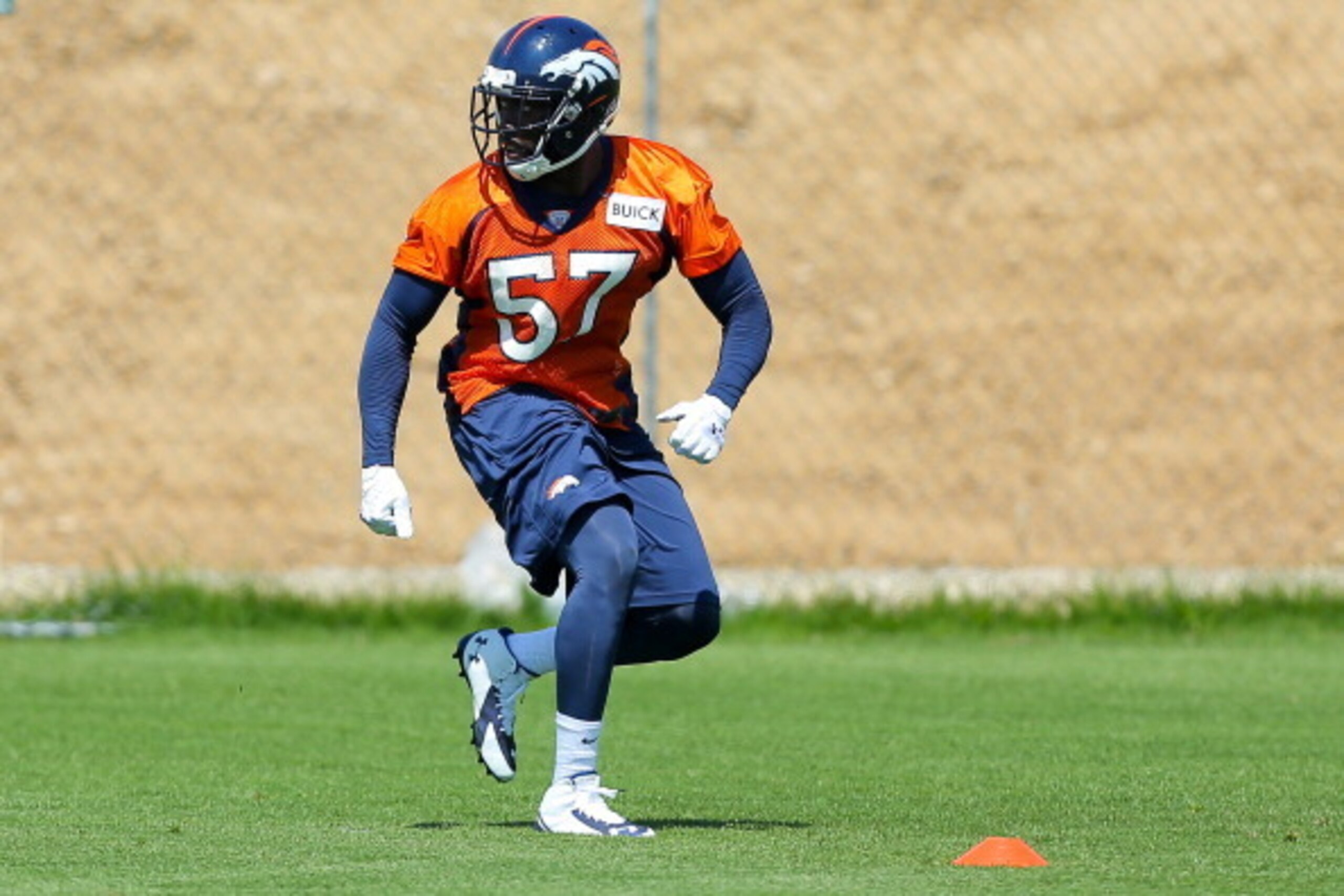 ENGLEWOOD, CO - MAY 17: Linebacker Lamin Barrow #57 of the Denver Broncos participates in drills during rookie minicamp at Dove Valley on May 17, 2014 in Englewood, Colorado. (Photo by Justin Edmonds/Getty Images) ENGLEWOOD, CO - MAY 17: Linebacker Lamin Barrow #57 of the Denver Broncos participates in drills during rookie minicamp at Dove Valley on May 17, 2014 in Englewood, Colorado. (Photo by Justin Edmonds/Getty Images)