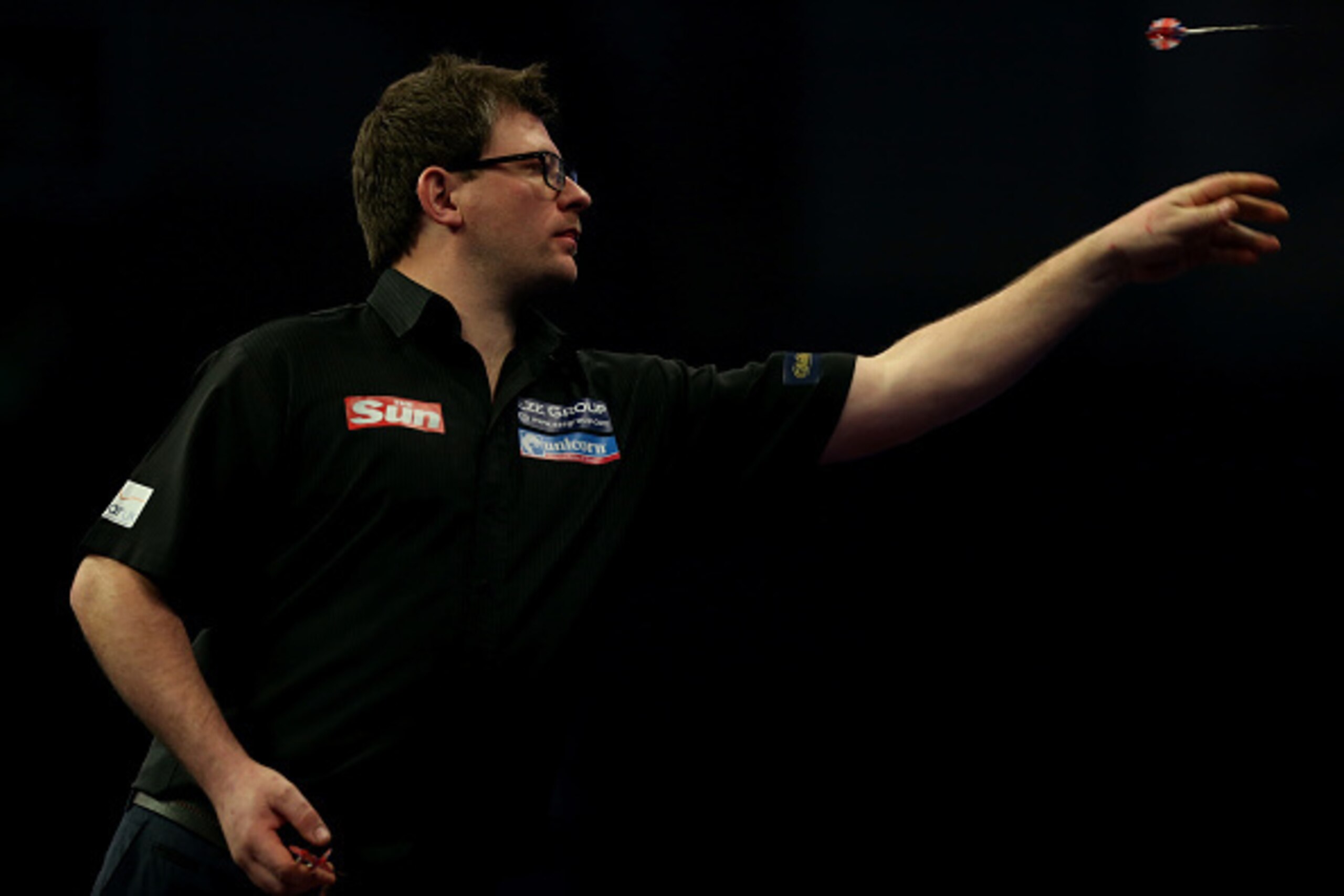 LONDON, ENGLAND - DECEMBER 21:   James Wade of England in action  during his first round match against  Jamie Lewis of Wales on day four of the 2015 William Hill PDC World Darts Championships  at Alexandra Palace on December 21, 2014 in London, England.  