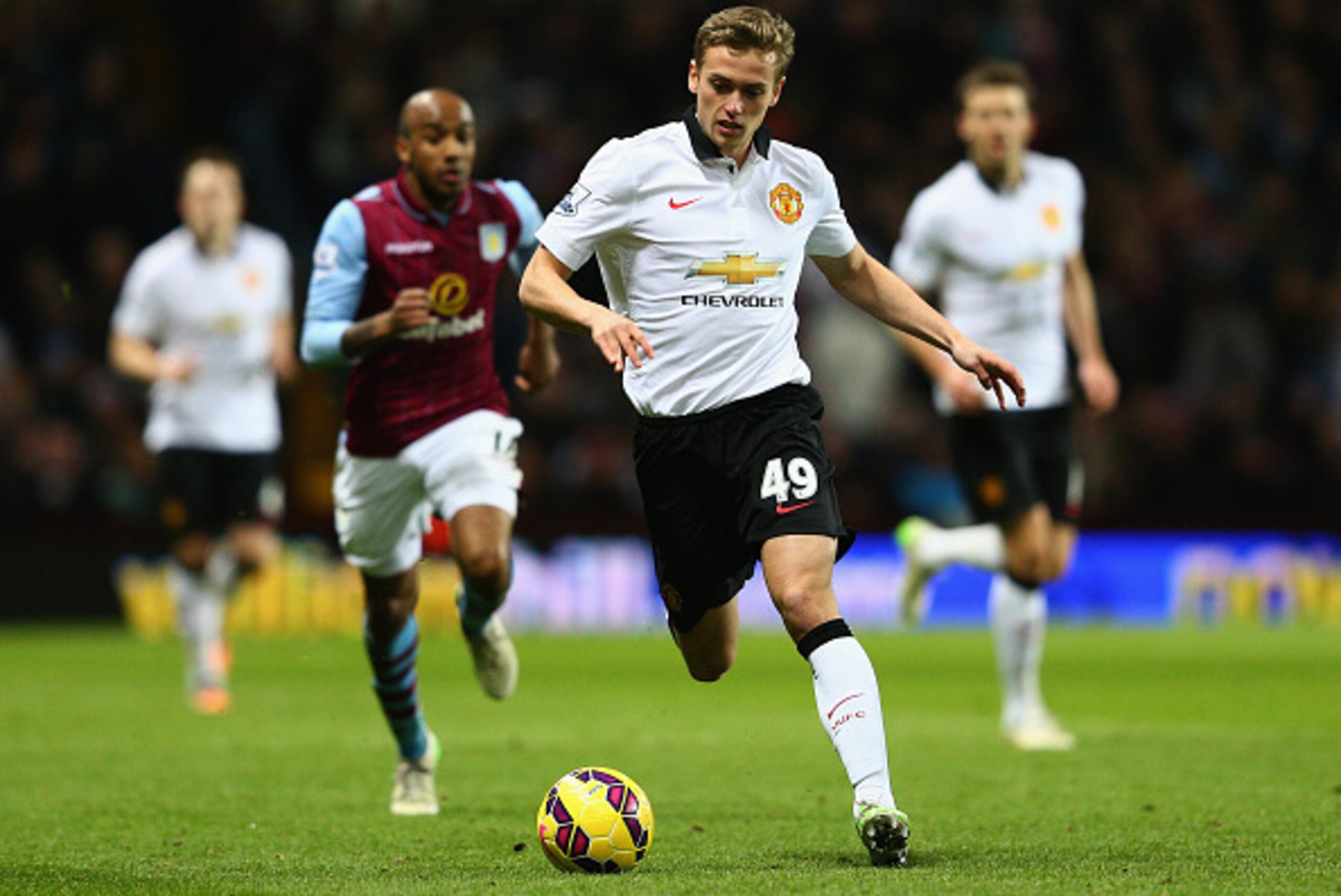 BIRMINGHAM, ENGLAND - DECEMBER 20:  James Wilson of Manchester United on the ball during the Barclays Premier League match between Aston Villa and Manchester United at Villa Park on December 20, 2014 in Birmingham, England.  (Photo by Clive Mason/Getty Im