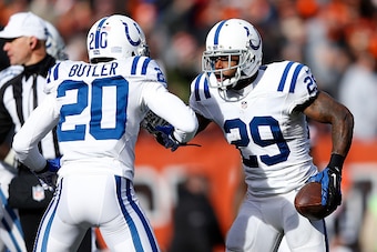 CLEVELAND, OH - DECEMBER 07:  Mike Adams #29 celebrates his interception with Darius Butler #20 of the Indianapolis Colts during the first quarter against the Cleveland Browns at FirstEnergy Stadium on December 7, 2014 in Cleveland, Ohio.  (Photo by Joe R
