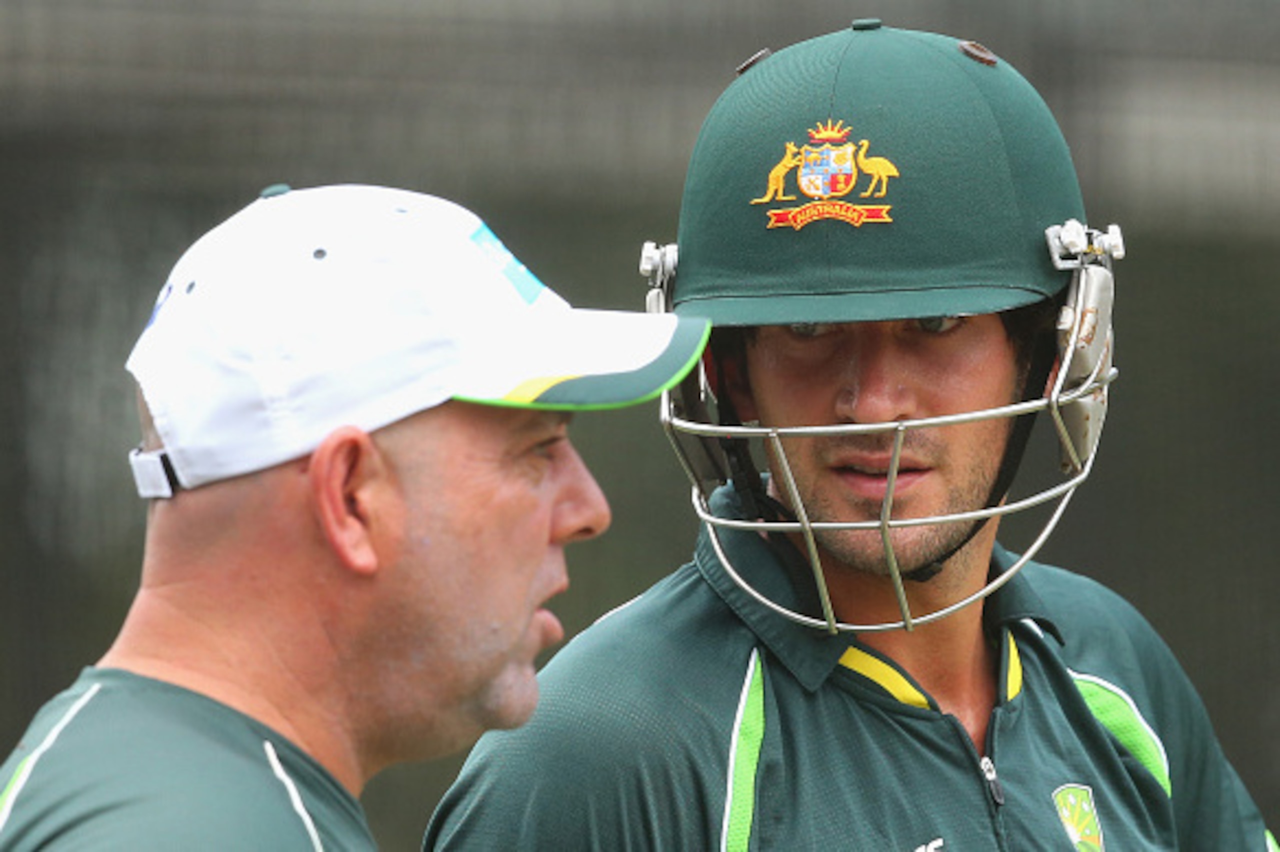 MELBOURNE, AUSTRALIA - DECEMBER 23:  Darren Lehmann the coach of Australia talks to Joe Burns during an Australian training session at Melbourne Cricket Ground on December 23, 2014 in Melbourne, Australia.  (Photo by Quinn Rooney/Getty Images)
