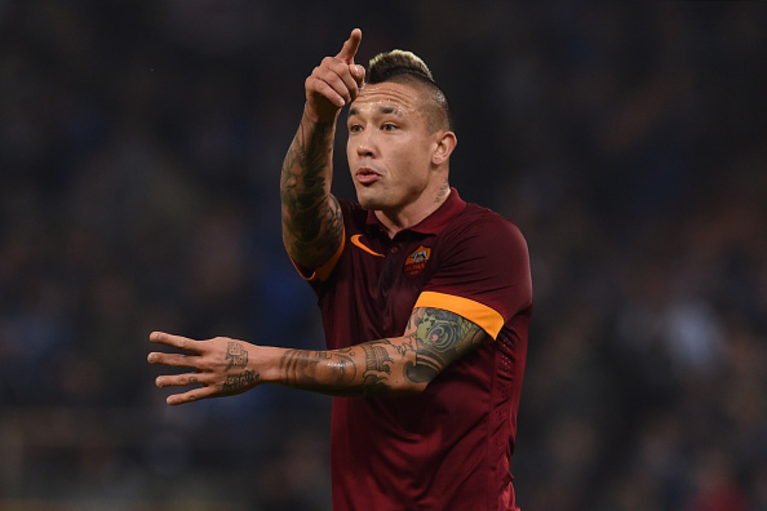 GENOA, ITALY - OCTOBER 25:  Radja Nainggolan of AS Roma reacts during the Serie A match between UC Sampdoria and AS Roma at Stadio Luigi Ferraris on October 25, 2014 in Genoa, Italy.  (Photo by Valerio Pennicino/Getty Images)