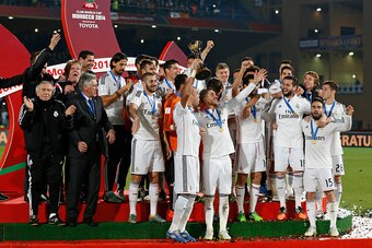 MARRAKECH, MOROCCO - DECEMBER 20: The Real Madrid CF celebrate with the FIFA Club World Cup trophy during a presentation ceremony after the FIFA Club World Cup Final match between Real Madrid CF and San Lorenzo at Le Grand Stade de Marrakech on December 2