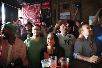 NEW YORK, NY - JUNE 16:  United States soccer fans react during the match between Ghana and USA at the WoodWork bar on June 16, 2014 in the Brooklyn borough of New York City. The U.S. won the match 2-1, moving on to face Portugal in Group G.  (Photo by Sp