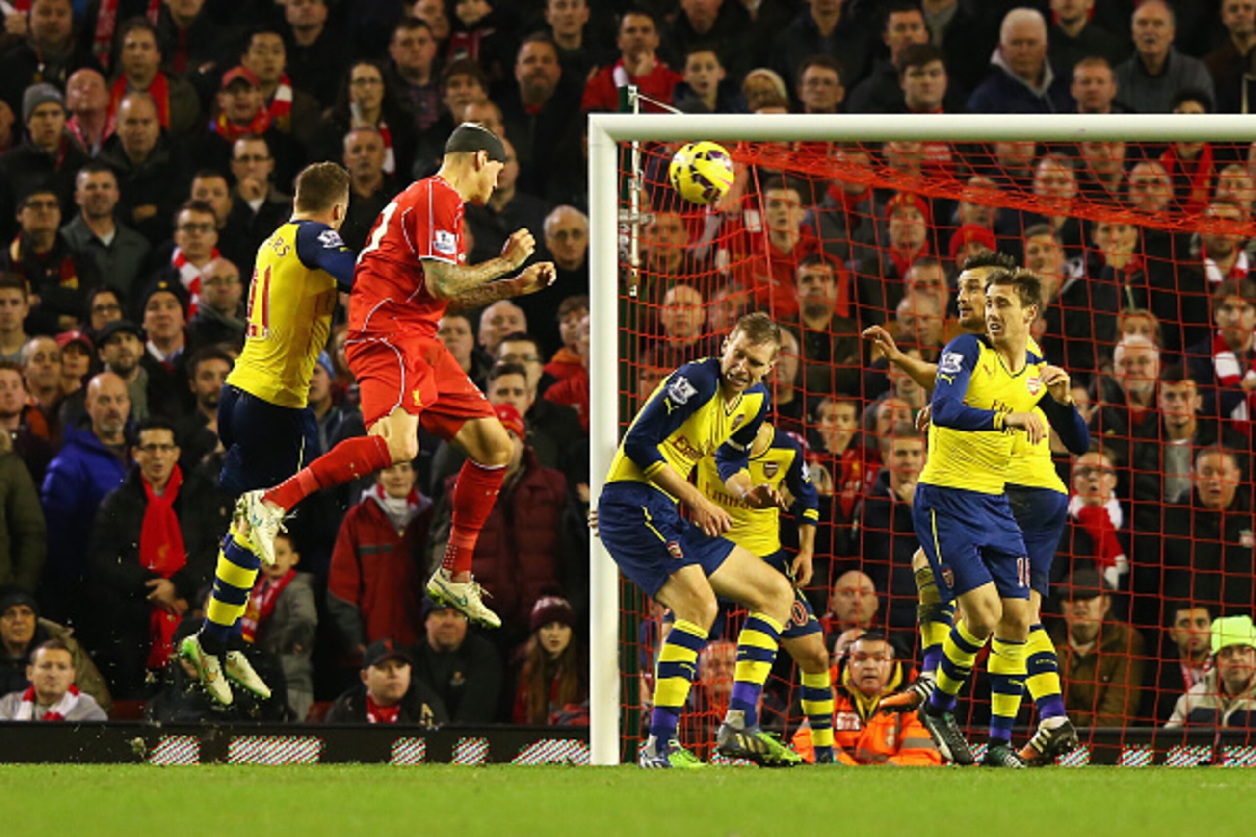 LIVERPOOL, ENGLAND - DECEMBER 21:  Martin Skrtel of Liverpool heads the equalising goal during the Barclays Premier League match between Liverpool and Arsenal at Anfield on December 21, 2014 in Liverpool, England.  (Photo by Alex Livesey/Getty Images)