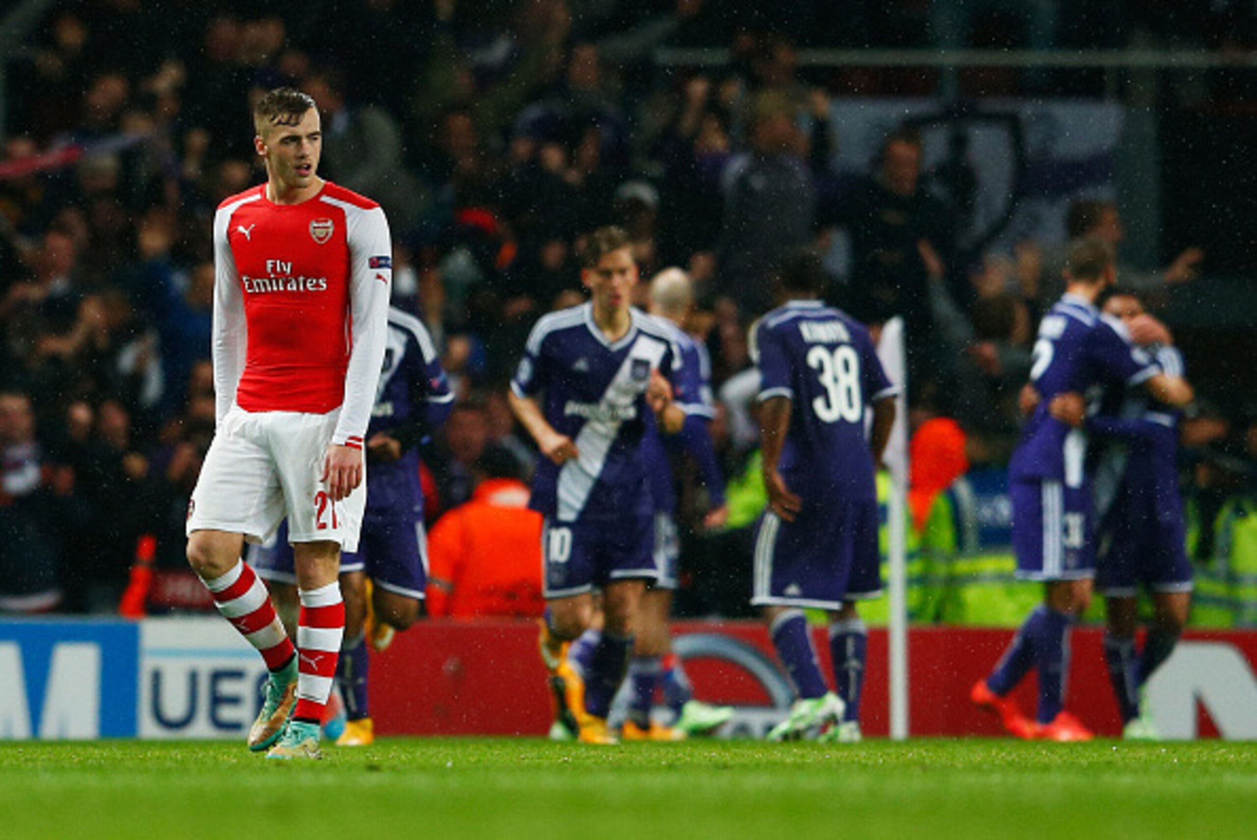 LONDON, ENGLAND - NOVEMBER 04:  Despair for Calum Chambers of Arsenal (21) as Aleksandar Mitrovic of Anderlecht (not pictured) scores their third goal during the UEFA Champions League Group D match between Arsenal FC and RSC Anderlecht at Emirates Stadium