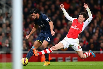 LONDON, ENGLAND - DECEMBER 03:  Laurent Koscielny of Arsenal attempts to block Graziano Pelle of Southampton during the Barclays Premier League match between Arsenal and Southampton at Emirates Stadium on December 3, 2014 in London, England.  (Photo by Mi