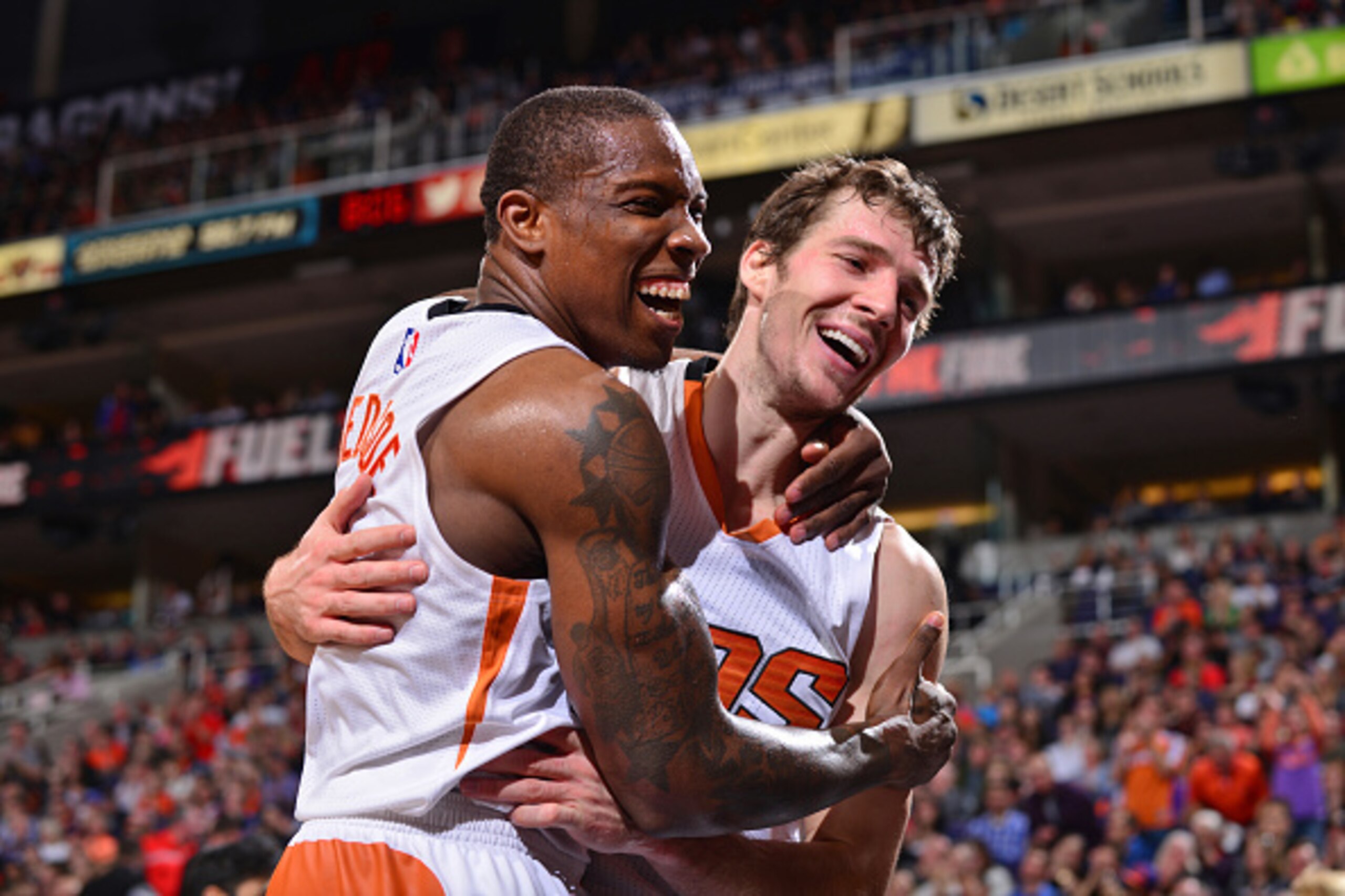 PHOENIX, AZ - DECEMBER 23:  Eric Bledsoe #2 and Goran Dragic #1 of the Phoenix Suns celebrate during the game against the Dallas Mavericks on December 23, 2014 at U.S. Airways Center in Phoenix, Arizona. NOTE TO USER: User expressly acknowledges and agree