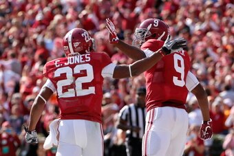 TUSCALOOSA, AL - OCTOBER 26:  Amari Cooper #9 of the Alabama Crimson Tide reacts with Christion Jones #22 after taking a reception in for a touchdown against the Tennessee Volunteers at Bryant-Denny Stadium on October 26, 2013 in Tuscaloosa, Alabama.  (Ph