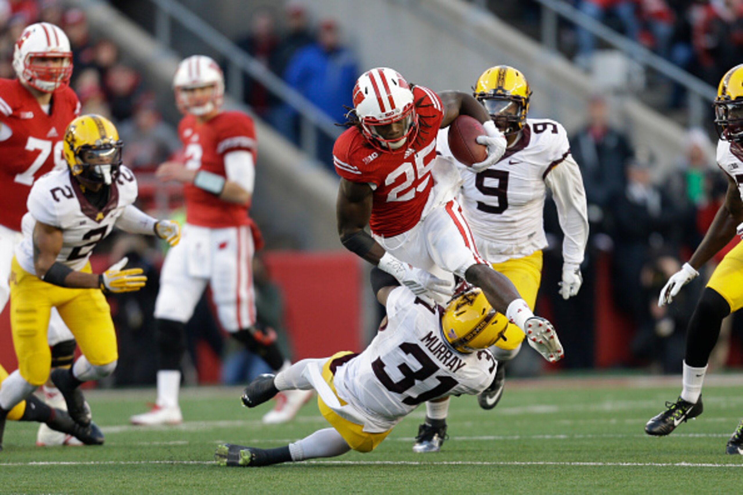 MADISON, WI - NOVEMBER 29: Melvin Gordon #25 of the Wisconsin Badgers runs with the football during the first half of play against the Minnesota Golden Gophers at Camp Randall Stadium on November 29, 2014 in Madison, Wisconsin. (Photo by Mike McGinnis/Get