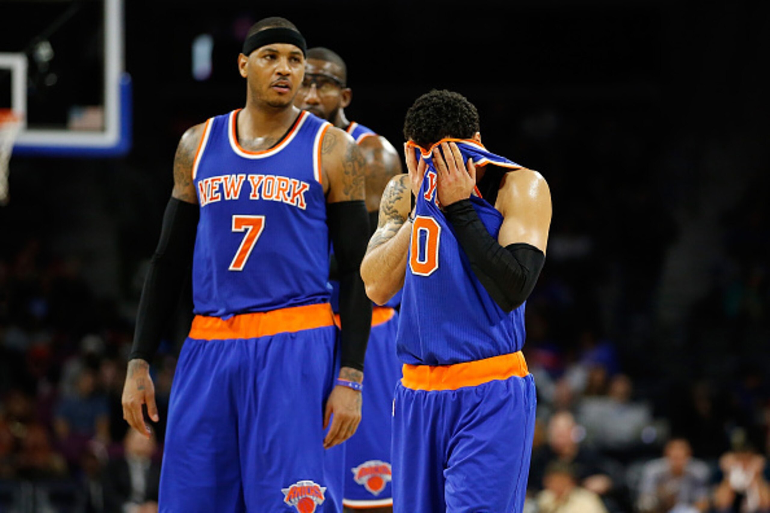 AUBURN HILLS, MI - NOVEMBER 05: Shane Larkin #0 of the New York Knicks reacts after a late fourth quarter turnover next to Carmelo Anthony #7 while playing the Detroit Pistons at the Palace of Auburn Hills on November 5, 2014 in Auburn Hills, Michigan. NO