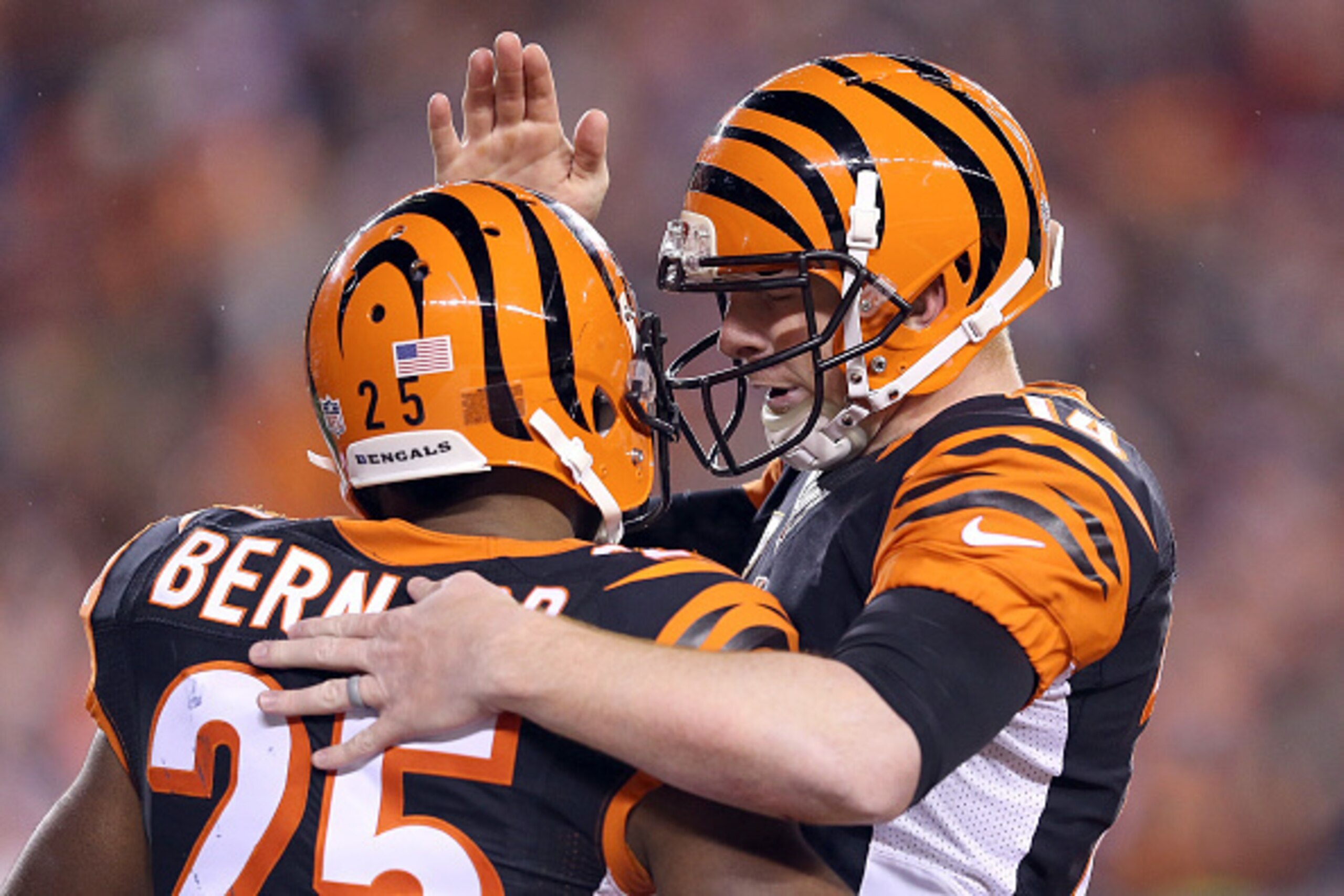 CINCINNATI, OH - DECEMBER 22:  Andy Dalton #14 of the Cincinnati Bengals congratulates Giovani Bernard #25 of the Cincinnati Bengals after scoring a touchdown during the third quarter of the game against the Denver Broncos at Paul Brown Stadium on Decembe