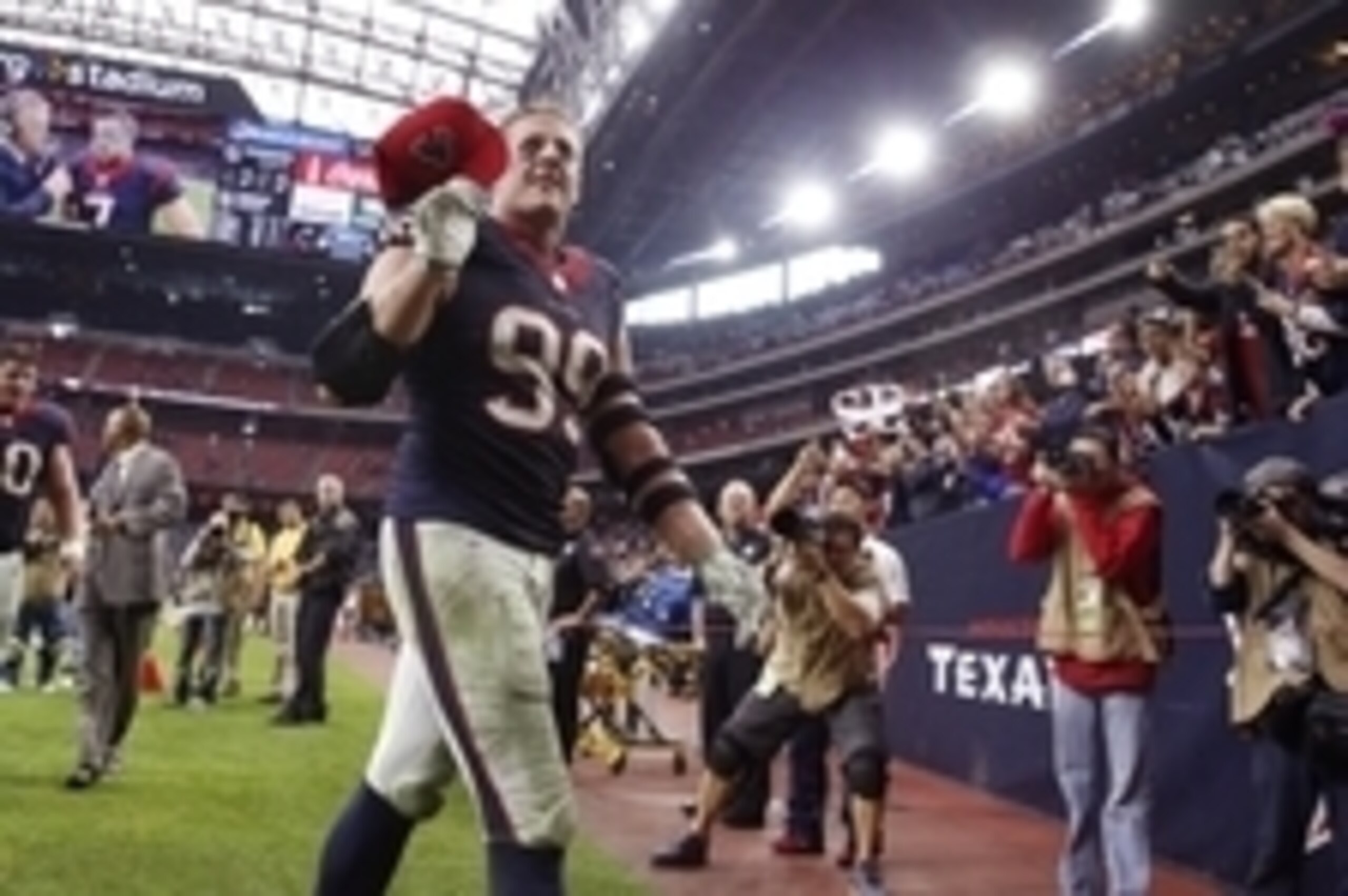 Dec 21, 2014; Houston, TX, USA; Houston Texans defensive end J.J. Watt (99) waves to fans after the game against the Baltimore Ravens at NRG Stadium. Mandatory Credit: Kevin Jairaj-USA TODAY Sports