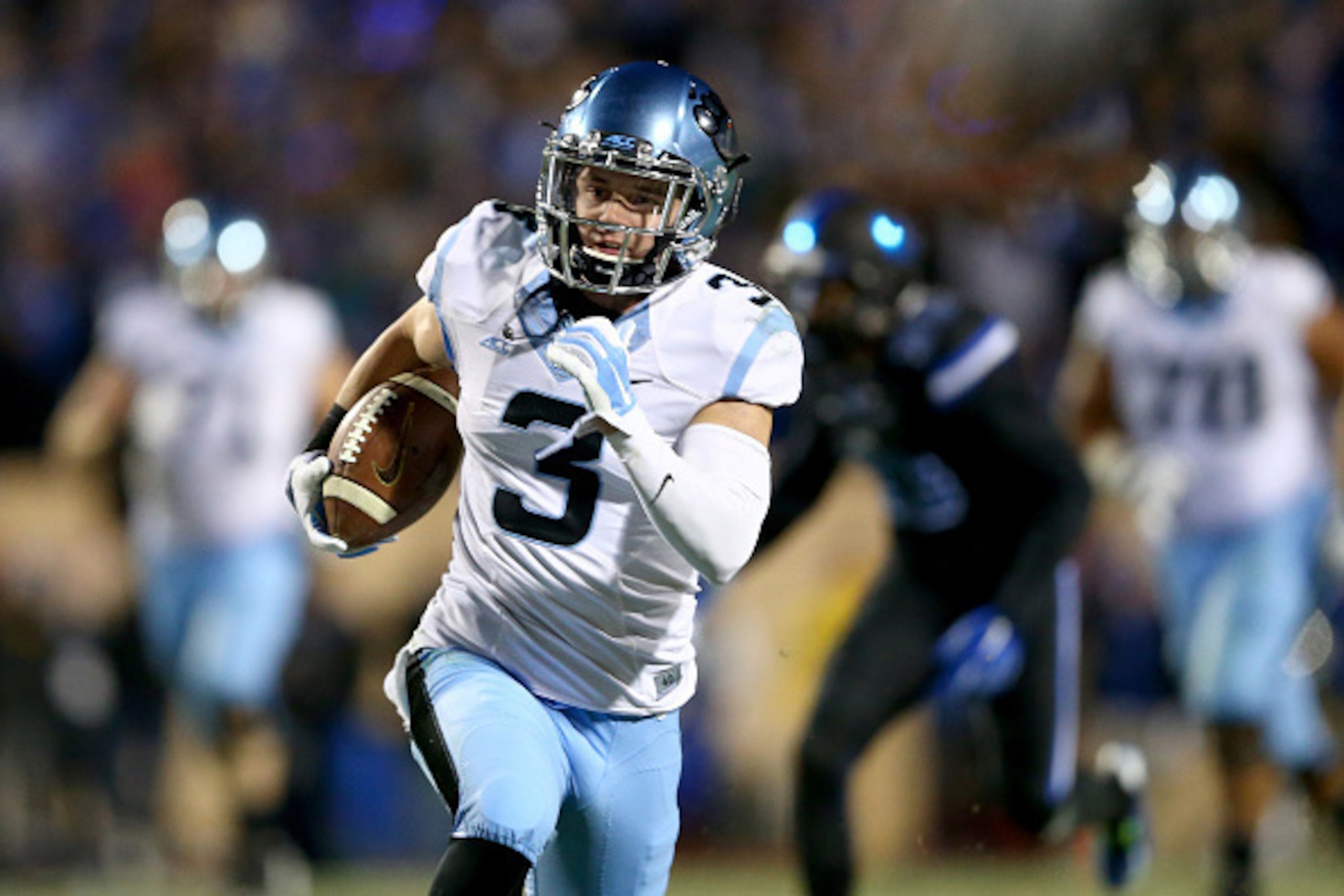 DURHAM, NC - NOVEMBER 20:  Ryan Switzer #3 of the North Carolina Tar Heels runs with the ball against the Duke Blue Devils during their game at Wallace Wade Stadium on November 20, 2014 in Durham, North Carolina.  (Photo by Streeter Lecka/Getty Images)