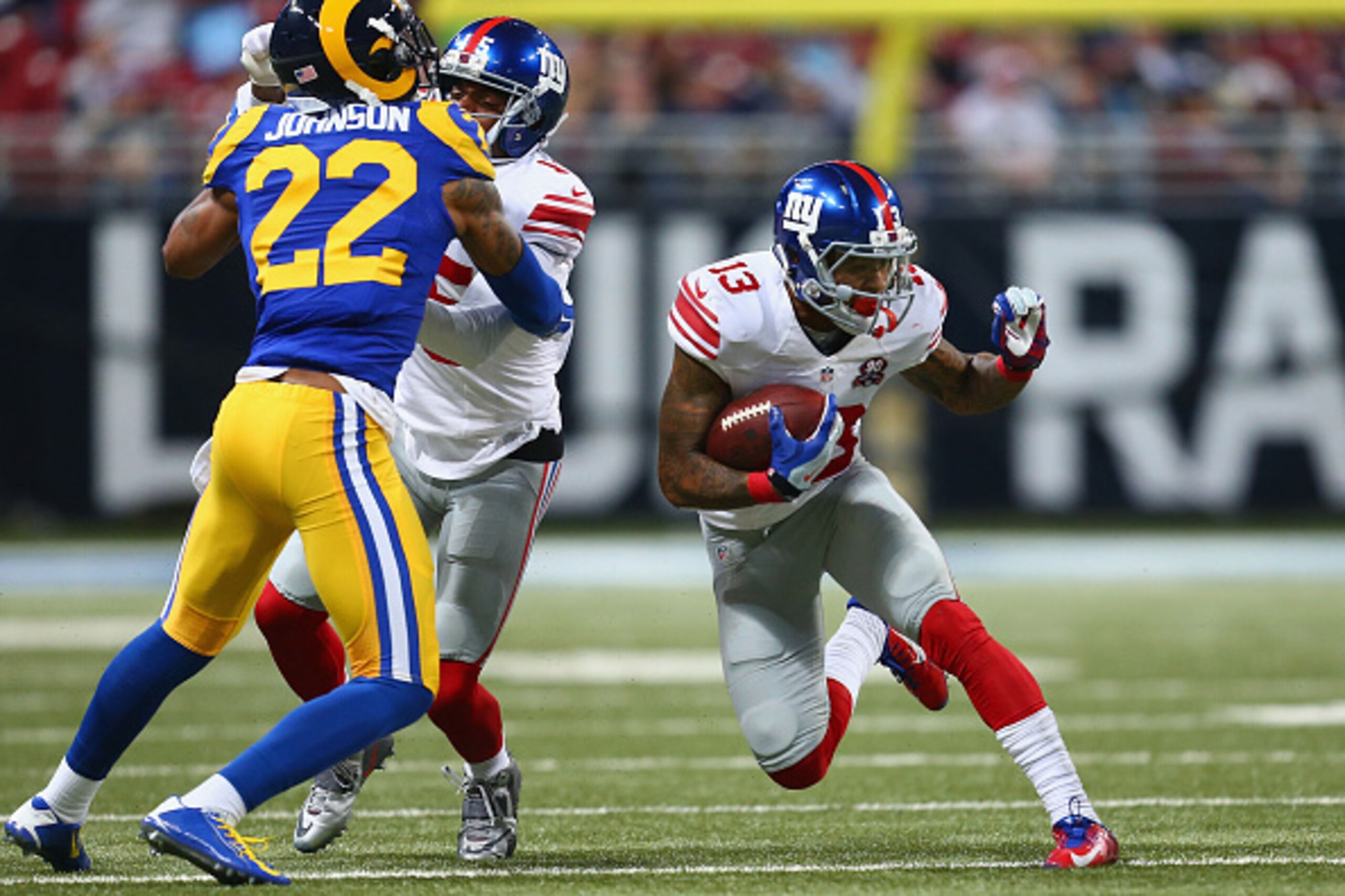 ST. LOUIS, MO - DECEMBER 21: Odell Beckham Jr. #13 of the New York Giants runs up field after making a catch against the St. Louis Rams during the fourth quarter at the Edward Jones Dome on December 21, 2014 in St. Louis, Missouri.  (Photo by Dilip Vishwa