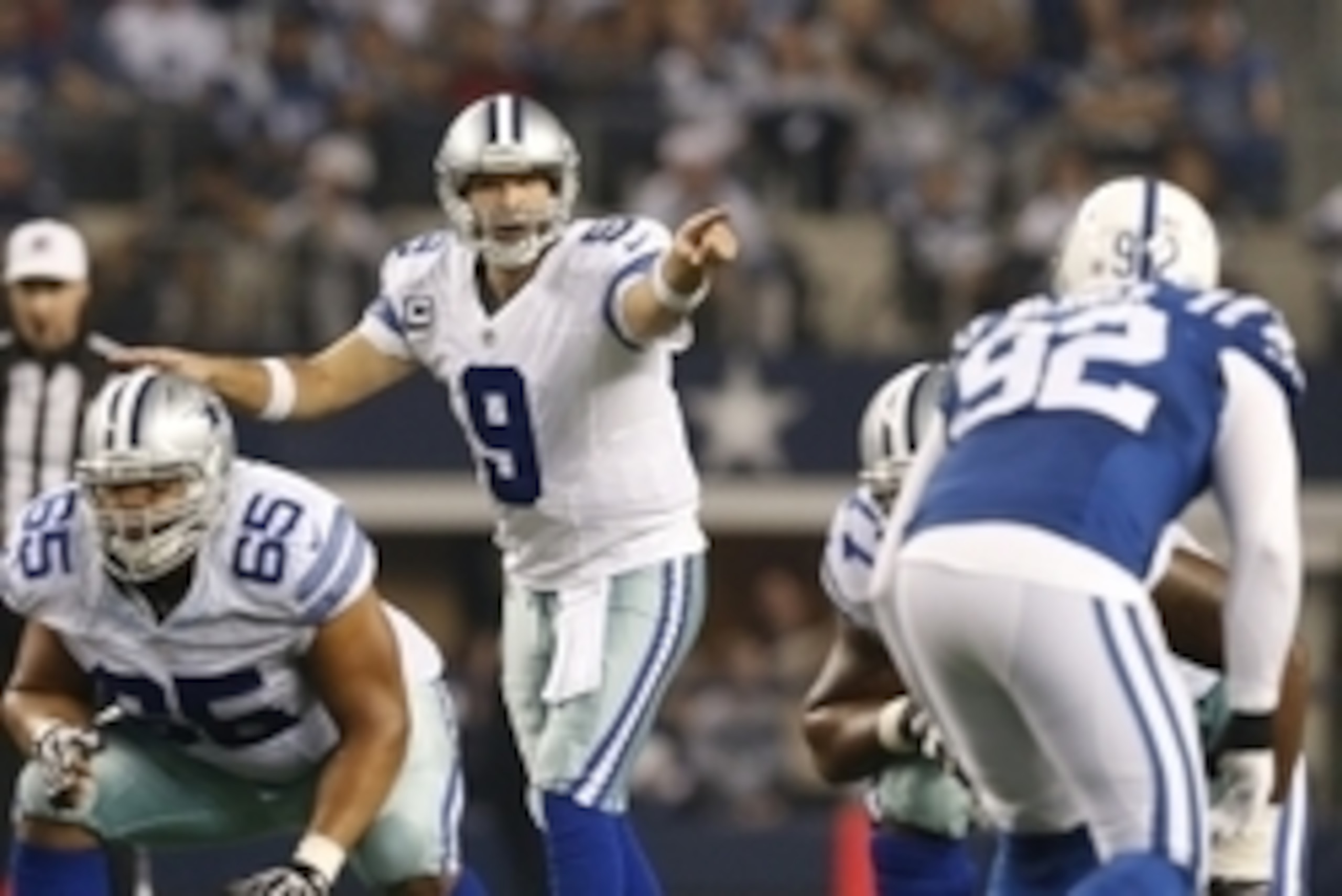 Dec 21, 2014; Arlington, TX, USA; Dallas Cowboys quarterback Tony Romo (9) signals prior to the snap against the Indianapolis Colts at AT&T Stadium. Mandatory Credit: Matthew Emmons-USA TODAY Sports
