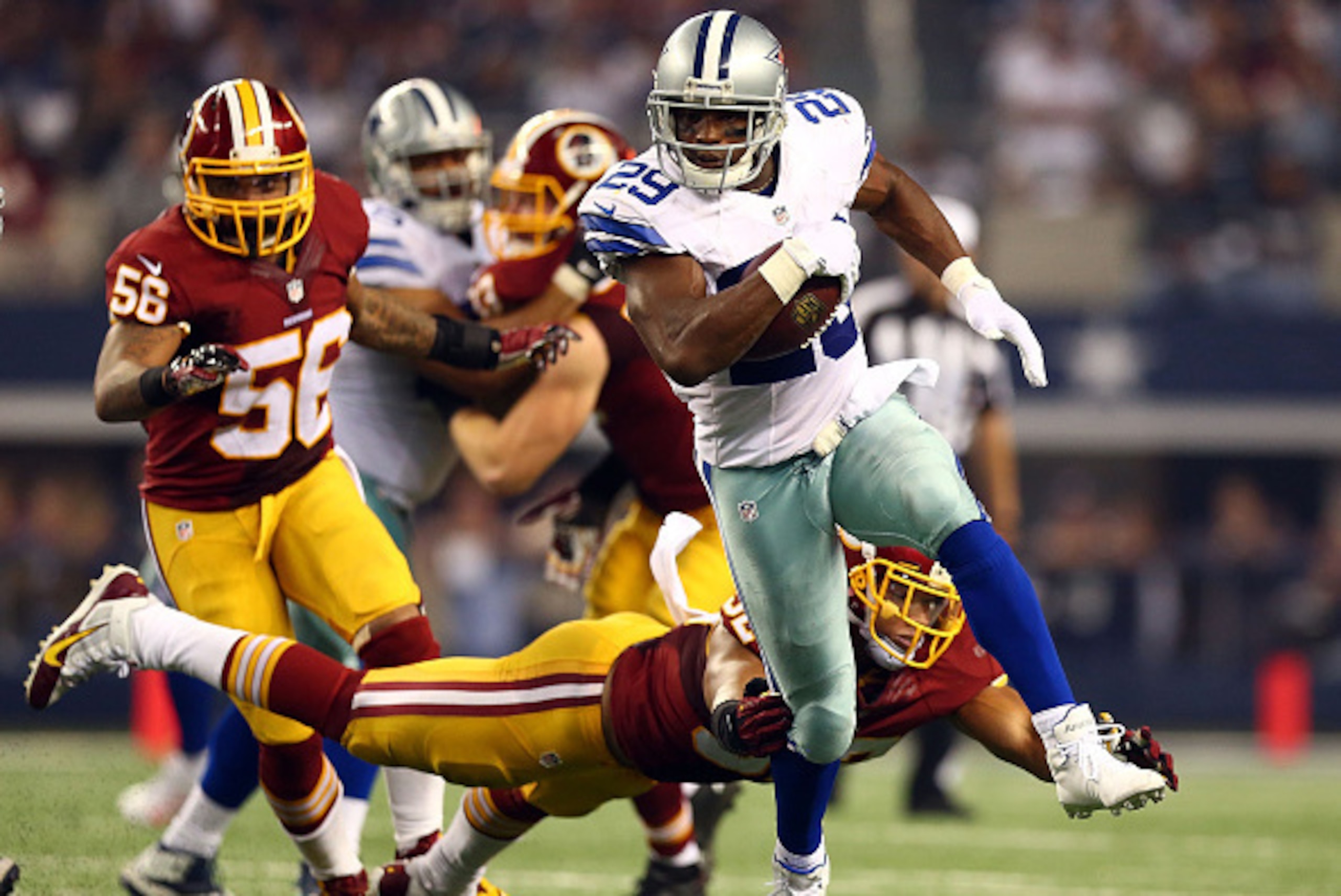 ARLINGTON, TX - OCTOBER 27: DeMarco Murray #29 of the Dallas Cowboys carries the ball against the Washington Redskins during the second half at AT&T Stadium on October 27, 2014 in Arlington, Texas. (Photo by Ronald Martinez/Getty Images) ARLINGTON, TX - OCTOBER 27: DeMarco Murray #29 of the Dallas Cowboys carries the ball against the Washington Redskins during the second half at AT&T Stadium on October 27, 2014 in Arlington, Texas. (Photo by Ronald Martinez/Getty Images)
