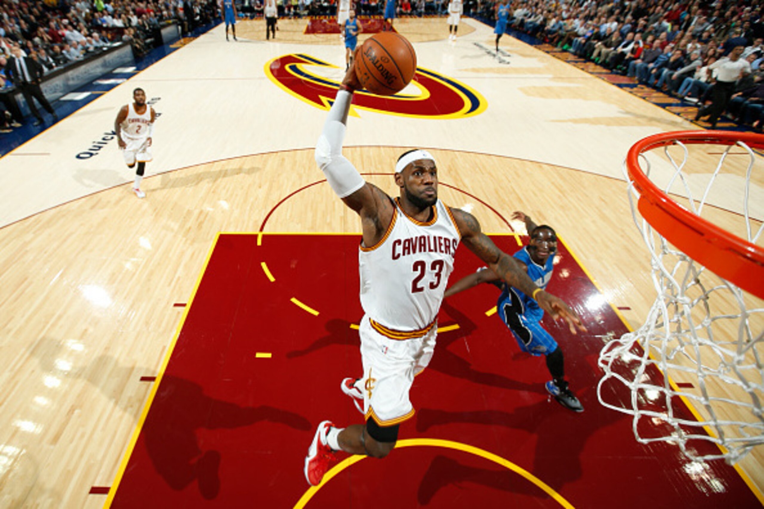 CLEVELAND, OH - NOVEMBER 24:  LeBron James #23 of the Cleveland Cavaliers drives to the basket against the Orlando Magic at The Quicken Loans Arena on November 24, 2014 in Cleveland, Ohio. NOTE TO USER: User expressly acknowledges and agrees that, by down