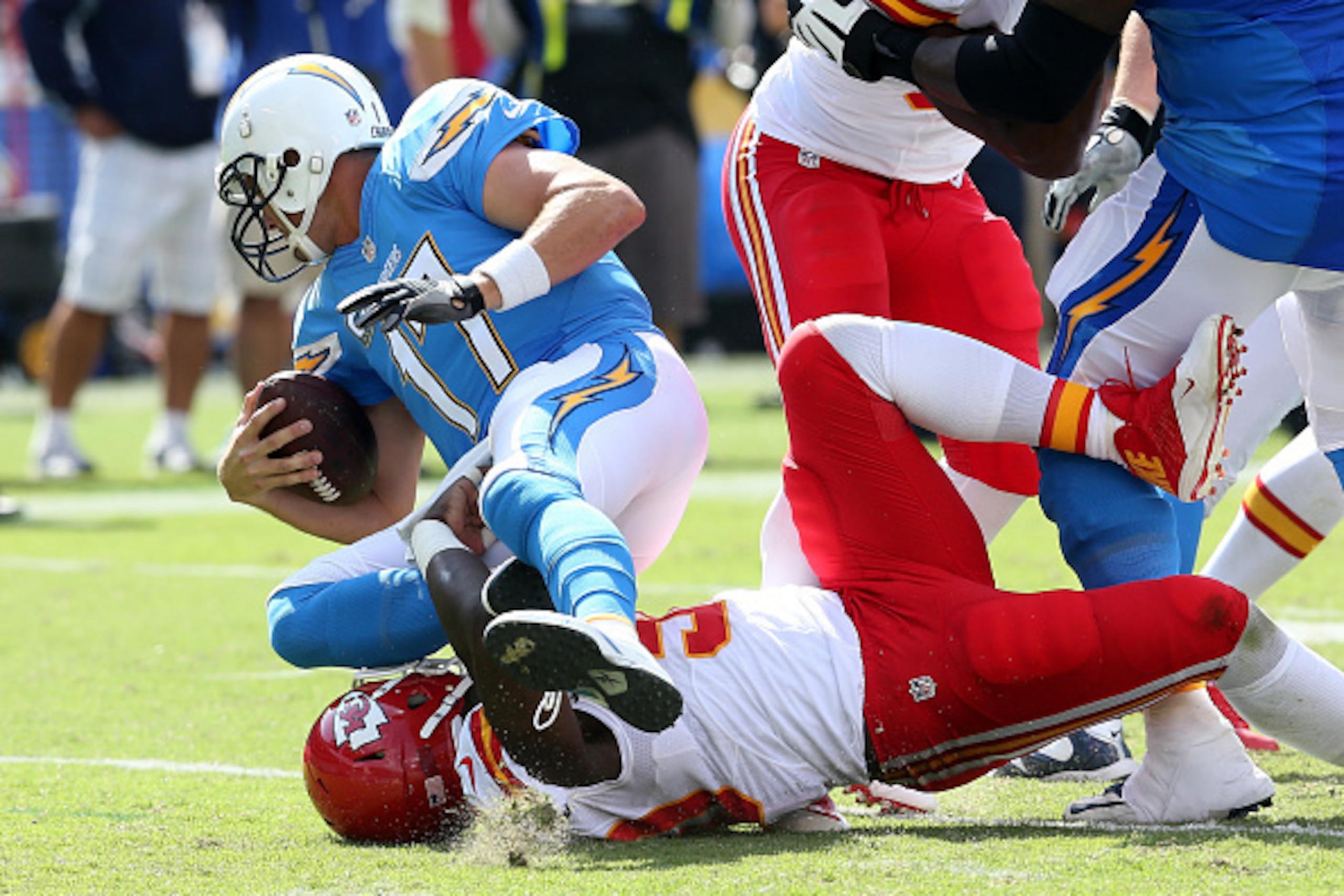 SAN DIEGO, CA - OCTOBER 19: Linebacker Justin Houston #50 of the Kansas City Chiefs sacks quarterback Philip Rivers #17 of the San Diego Chargers in the second quarter at Qualcomm Stadium on October 19, 2014 in San Diego, California.  (Photo by Stephen Du
