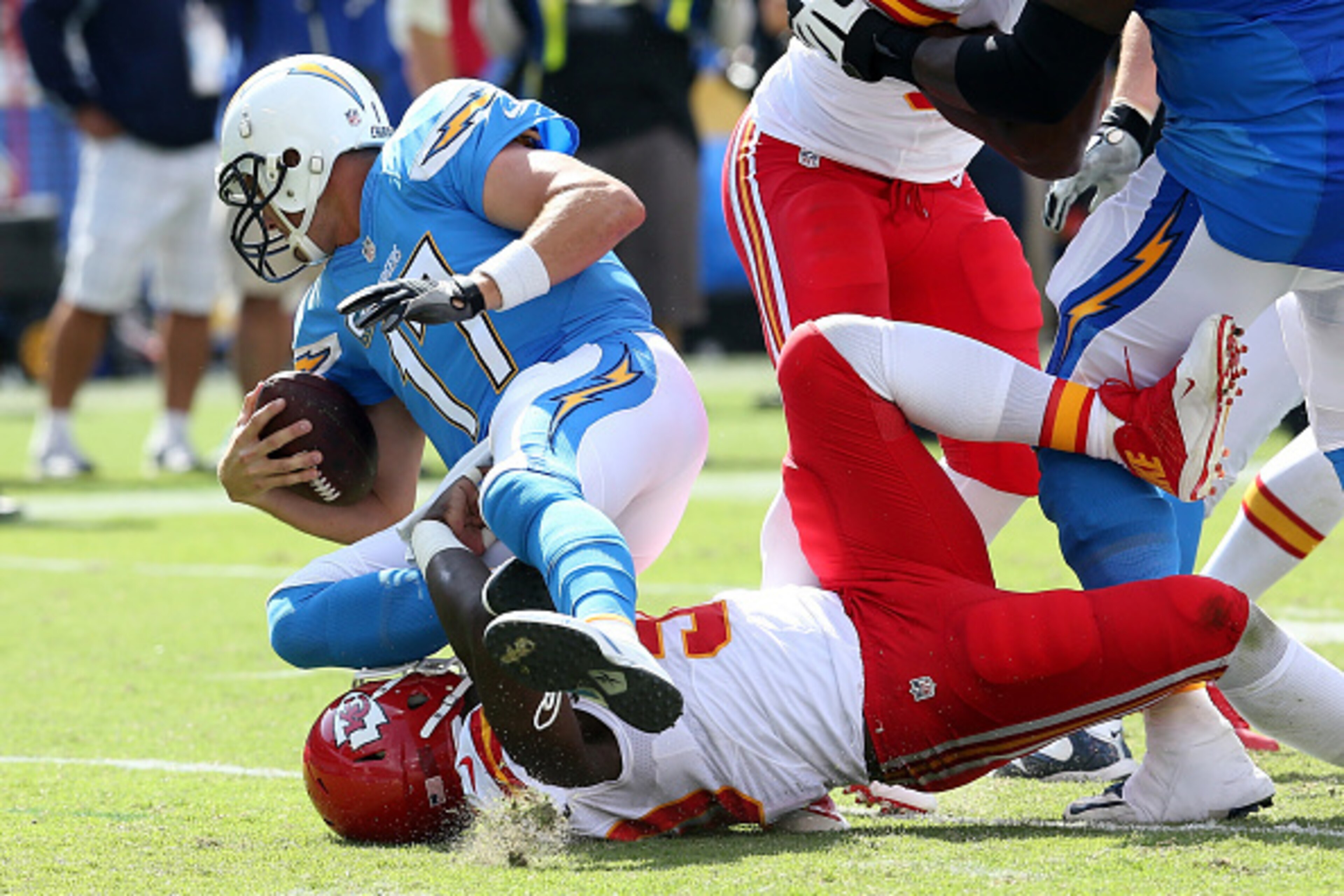 SAN DIEGO, CA - OCTOBER 19: Linebacker Justin Houston #50 of the Kansas City Chiefs sacks quarterback Philip Rivers #17 of the San Diego Chargers in the second quarter at Qualcomm Stadium on October 19, 2014 in San Diego, California.  (Photo by Stephen Du