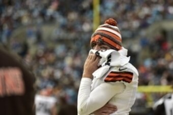 Dec 21, 2014; Charlotte, NC, USA; Cleveland Browns quarterback Johnny Manziel (2) on the sidelines in the third quarter at Bank of America Stadium. Mandatory Credit: Bob Donnan-USA TODAY Sports Dec 21, 2014; Charlotte, NC, USA; Cleveland Browns quarterback Johnny Manziel (2) on the sidelines in the third quarter at Bank of America Stadium. Mandatory Credit: Bob Donnan-USA TODAY Sports