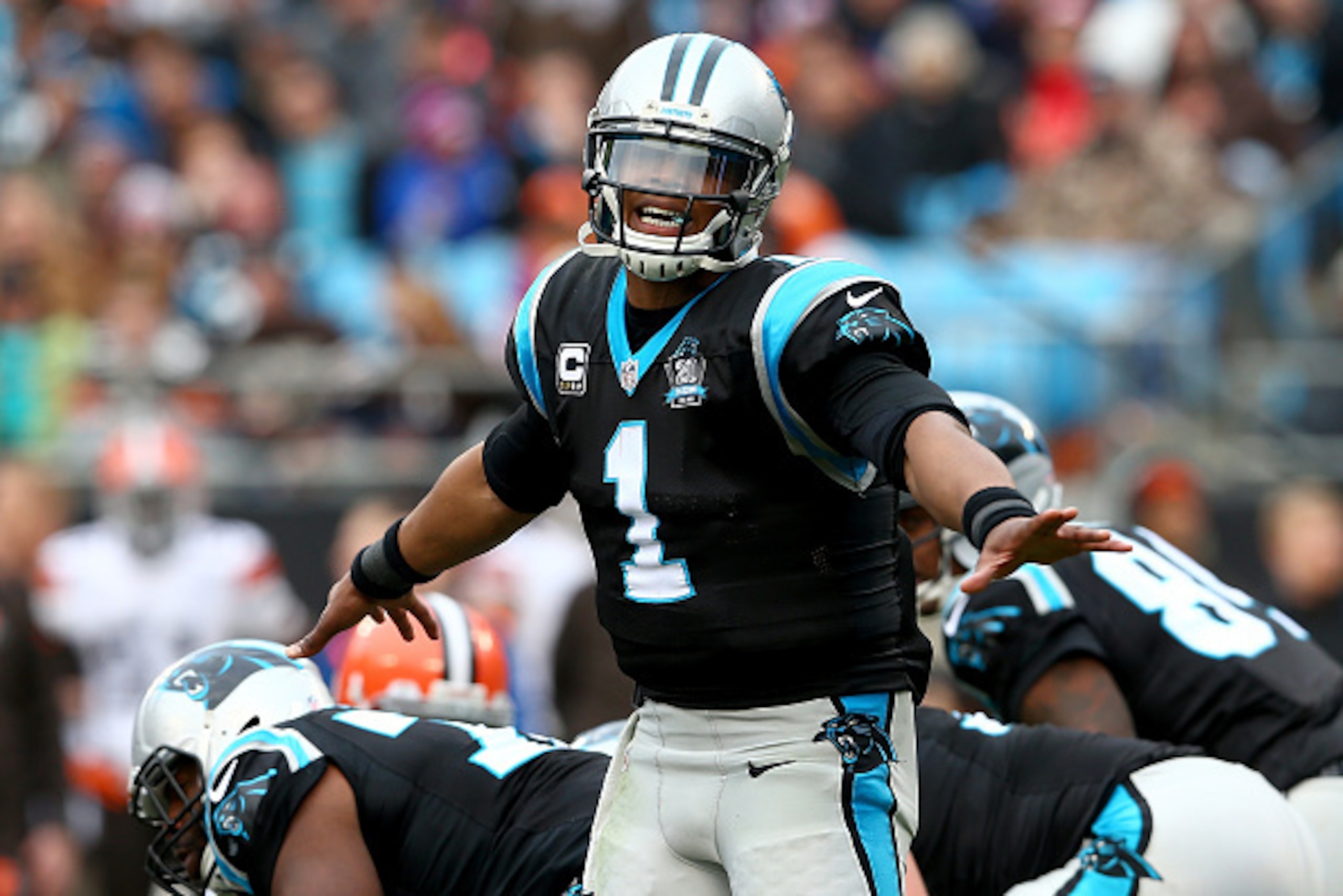 CHARLOTTE, NC - DECEMBER 21:  Cam Newton #1 of the Carolina Panthers calls a play against the Cleveland Browns during their game at Bank of America Stadium on December 21, 2014 in Charlotte, North Carolina.  (Photo by Streeter Lecka/Getty Images)