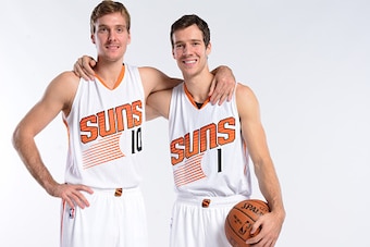 PHOENIX, AZ - SEPTEMBER 29: Zoran Dragic #10 and Goran Dragic #1 of the Phoenix Suns pose for a photo during Phoenix Suns Media Day on September 29, 2014 at U.S. Airways Center in Phoenix, Arizona. NOTE TO USER: User expressly acknowledges and agrees that