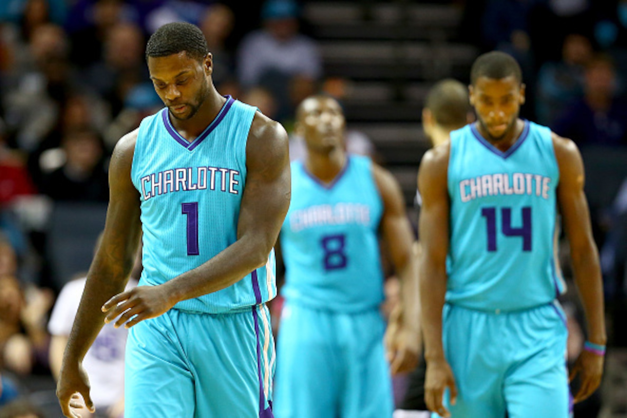 CHARLOTTE, NC - DECEMBER 13:  Lance Stephenson #1 of the Charlotte Hornets walks off the court against the Brooklyn Nets during their game at Time Warner Cable Arena on December 13, 2014 in Charlotte, North Carolina. NOTE TO USER: User expressly acknowled
