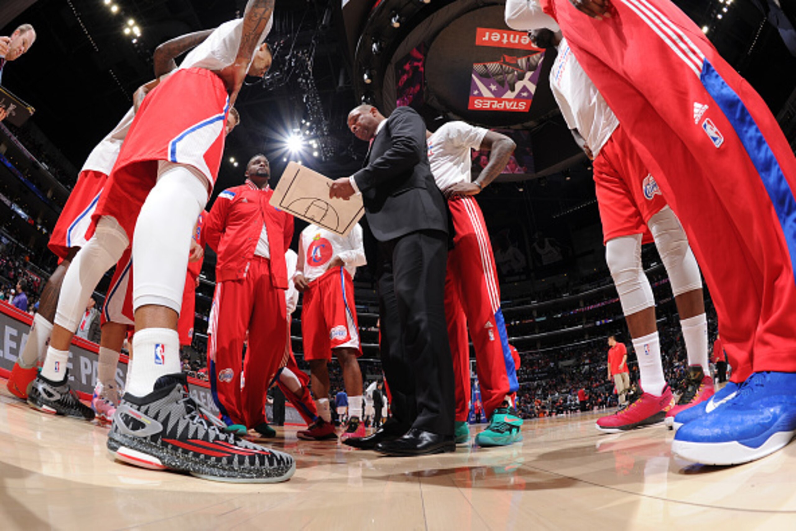 LOS ANGELES, CA - DECEMBER 25: Members of the Los Angeles Clippers huddle during a game against the Golden State Warriors at STAPLES Center on December 25, 2014 in Los Angeles, California. NOTE TO USER: User expressly acknowledges and agrees that, by down