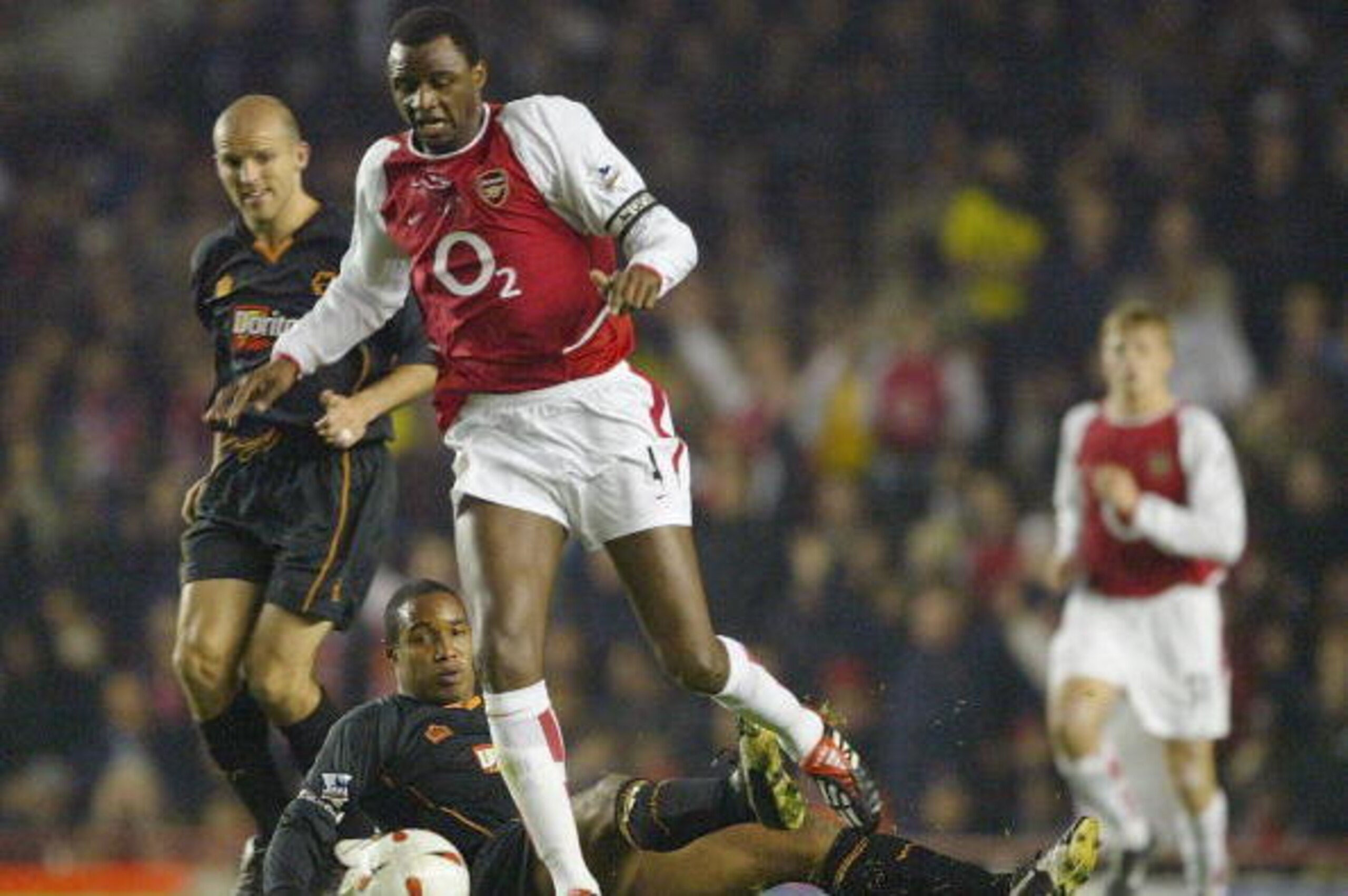 LONDON - DECEMBER 2: Paul Ince of Wolverhampton Wanderers tries to tackle Patrick Vieira of Arsenal during the Carling Cup fourth round match between Arsenal and Wolverhampton Wanderers at Highbury on December 2, 2003 in London. (Photo by Clive Mason/Gett LONDON - DECEMBER 2: Paul Ince of Wolverhampton Wanderers tries to tackle Patrick Vieira of Arsenal during the Carling Cup fourth round match between Arsenal and Wolverhampton Wanderers at Highbury on December 2, 2003 in London. (Photo by Clive Mason/Gett
