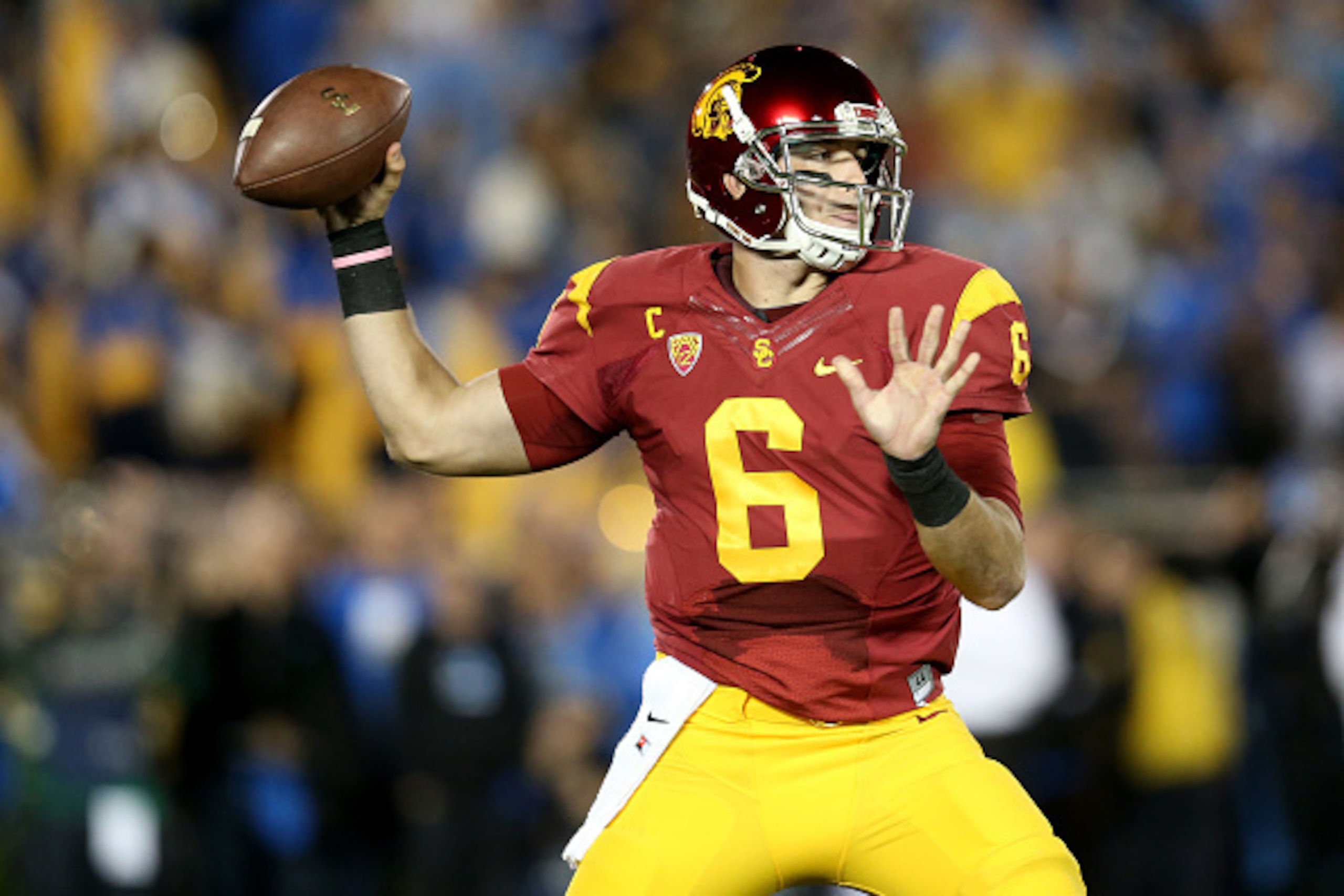 PASADENA, CA - NOVEMBER 22:  Quartreback Cody Kessler #6 of the USC Trojans throws a pass against the UCLA Bruins at the Rose Bowl on November 22, 2014 in Pasadena, California.  (Photo by Stephen Dunn/Getty Images)