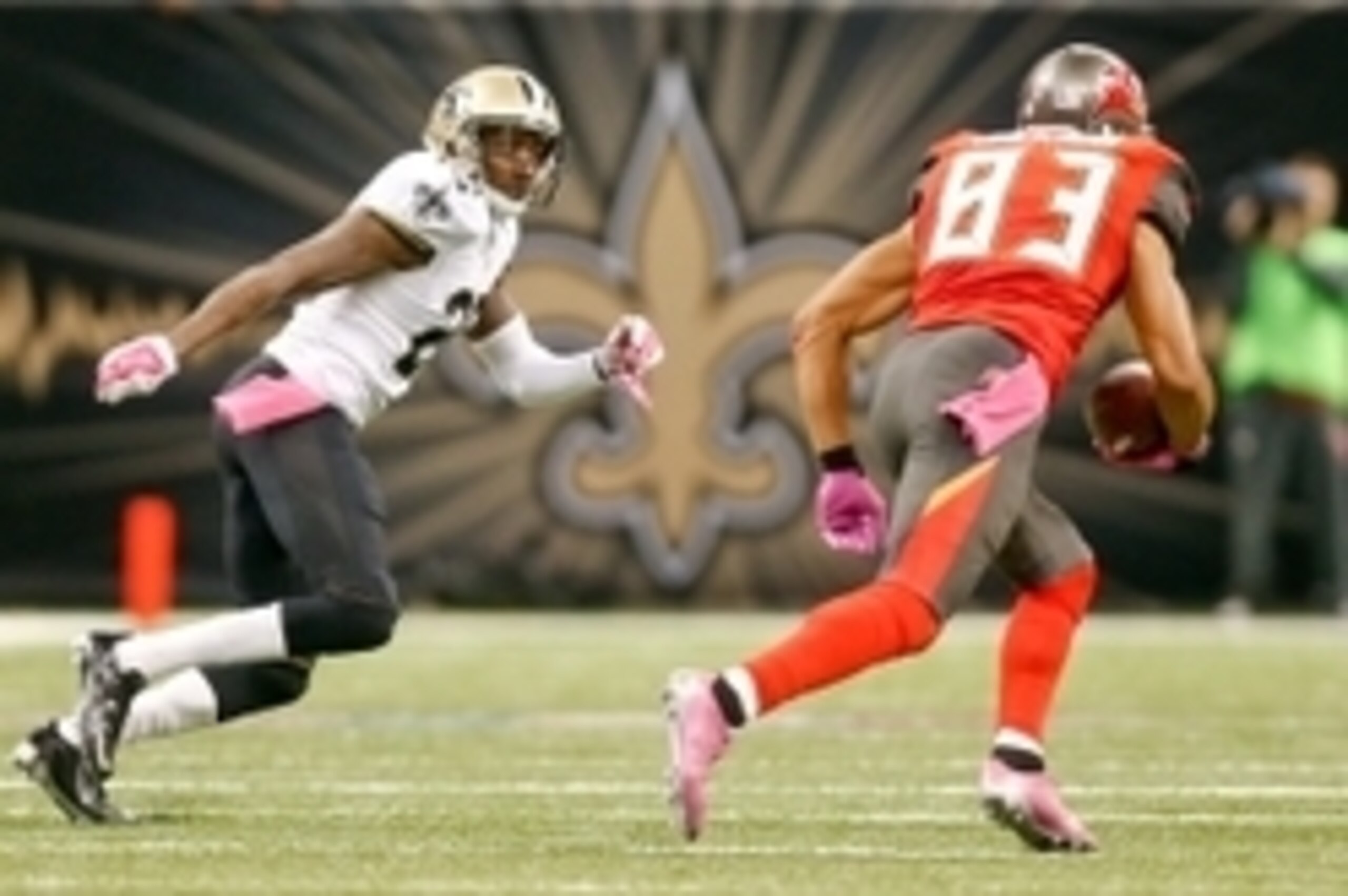 Oct 5, 2014; New Orleans, LA, USA; New Orleans Saints cornerback Keenan Lewis (28) pursues Tampa Bay Buccaneers wide receiver Vincent Jackson (83) during the second quarter of a game at Mercedes-Benz Superdome. Mandatory Credit: Derick E. Hingle-USA TODAY