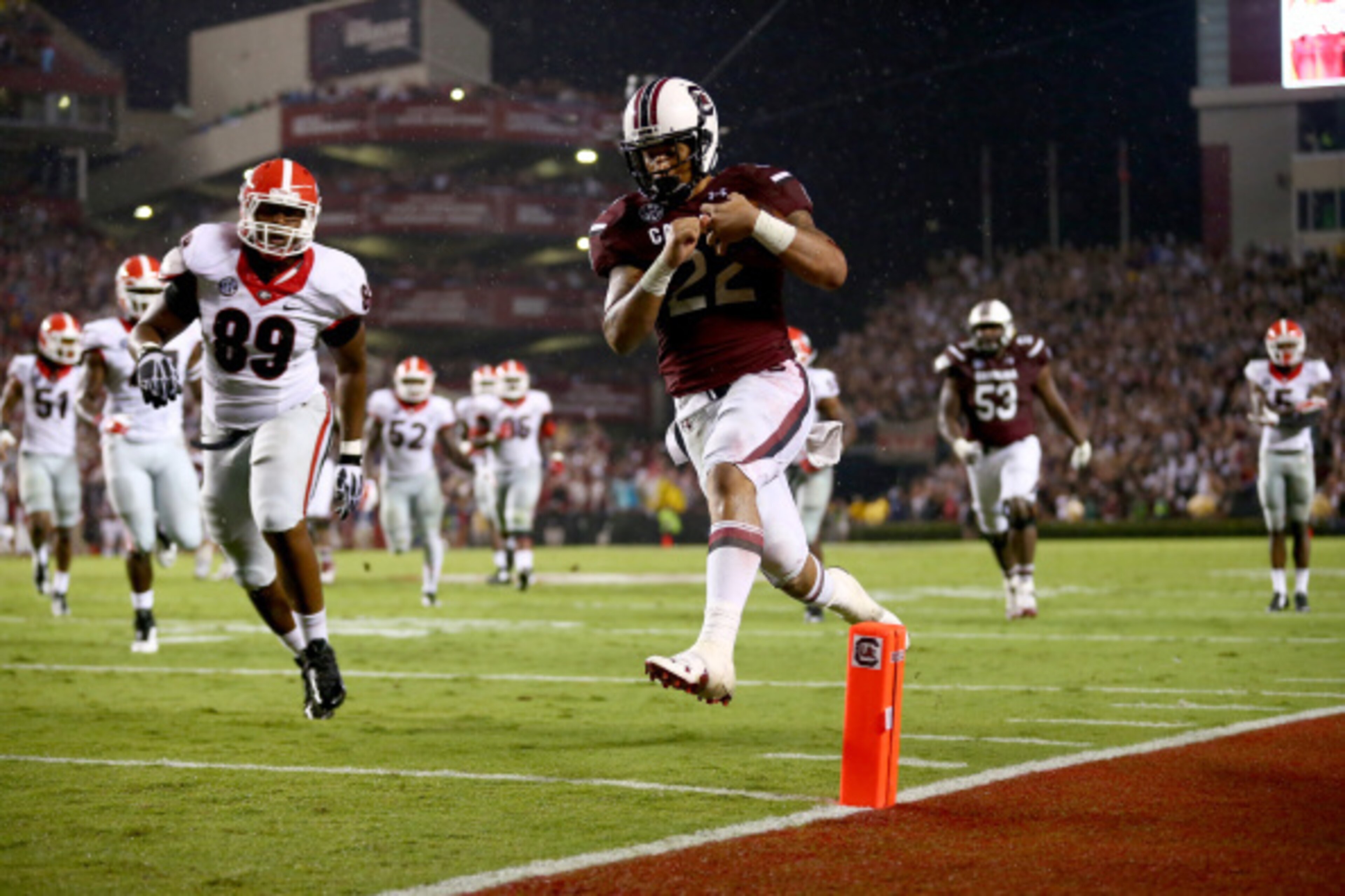 COLUMBIA, SC - SEPTEMBER 13:  James DeLoach #89 of the Georgia Bulldogs watches as Brandon Wilds #22 of the South Carolina Gamecocks runs for a touchdown during their game at Williams-Brice Stadium on September 13, 2014 in Columbia, South Carolina.  (Phot
