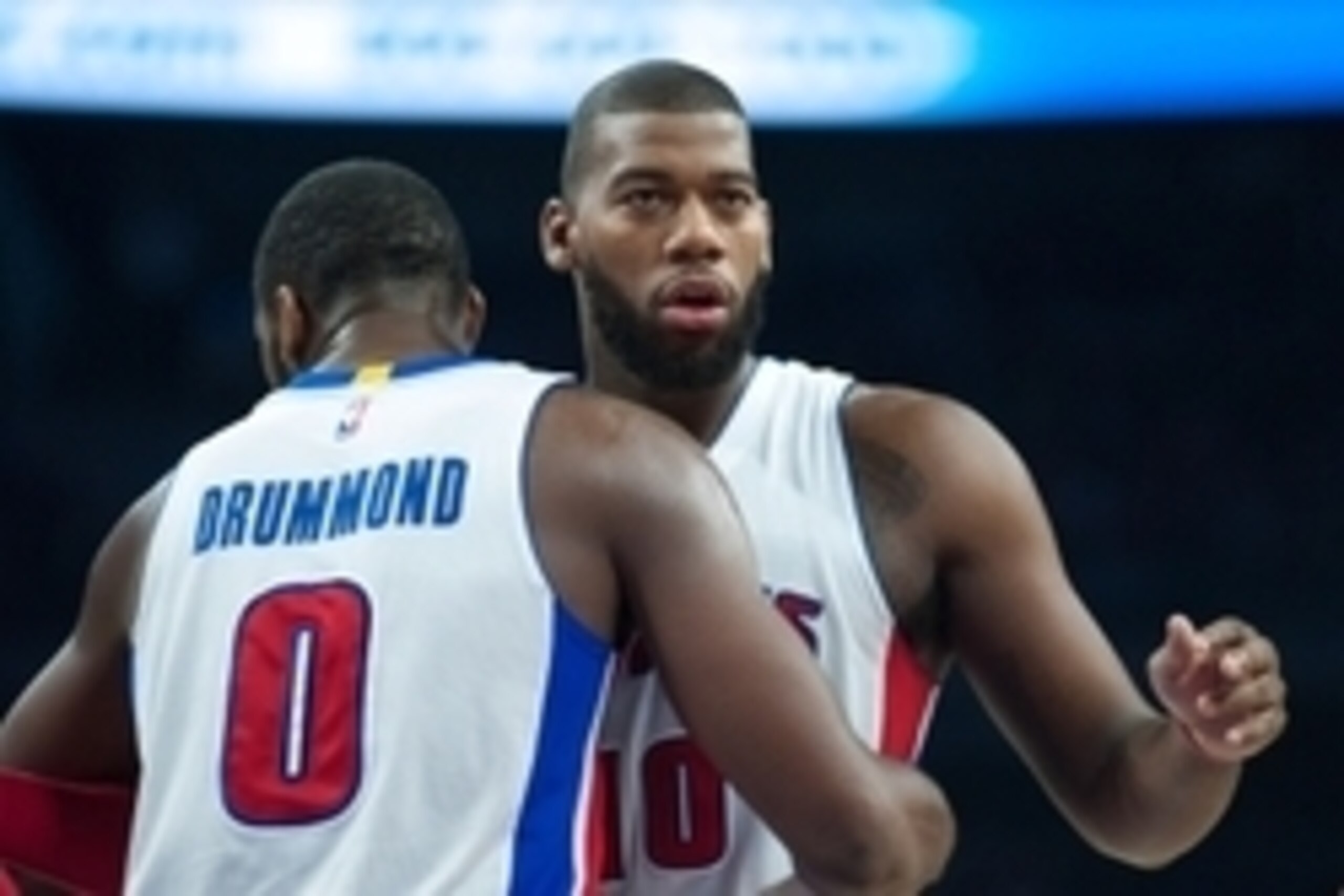 Nov 1, 2014; Auburn Hills, MI, USA; Detroit Pistons center Andre Drummond (0) hugs forward Greg Monroe (10) during the third quarter against the Brooklyn Nets at The Palace of Auburn Hills. Mandatory Credit: Tim Fuller-USA TODAY Sports