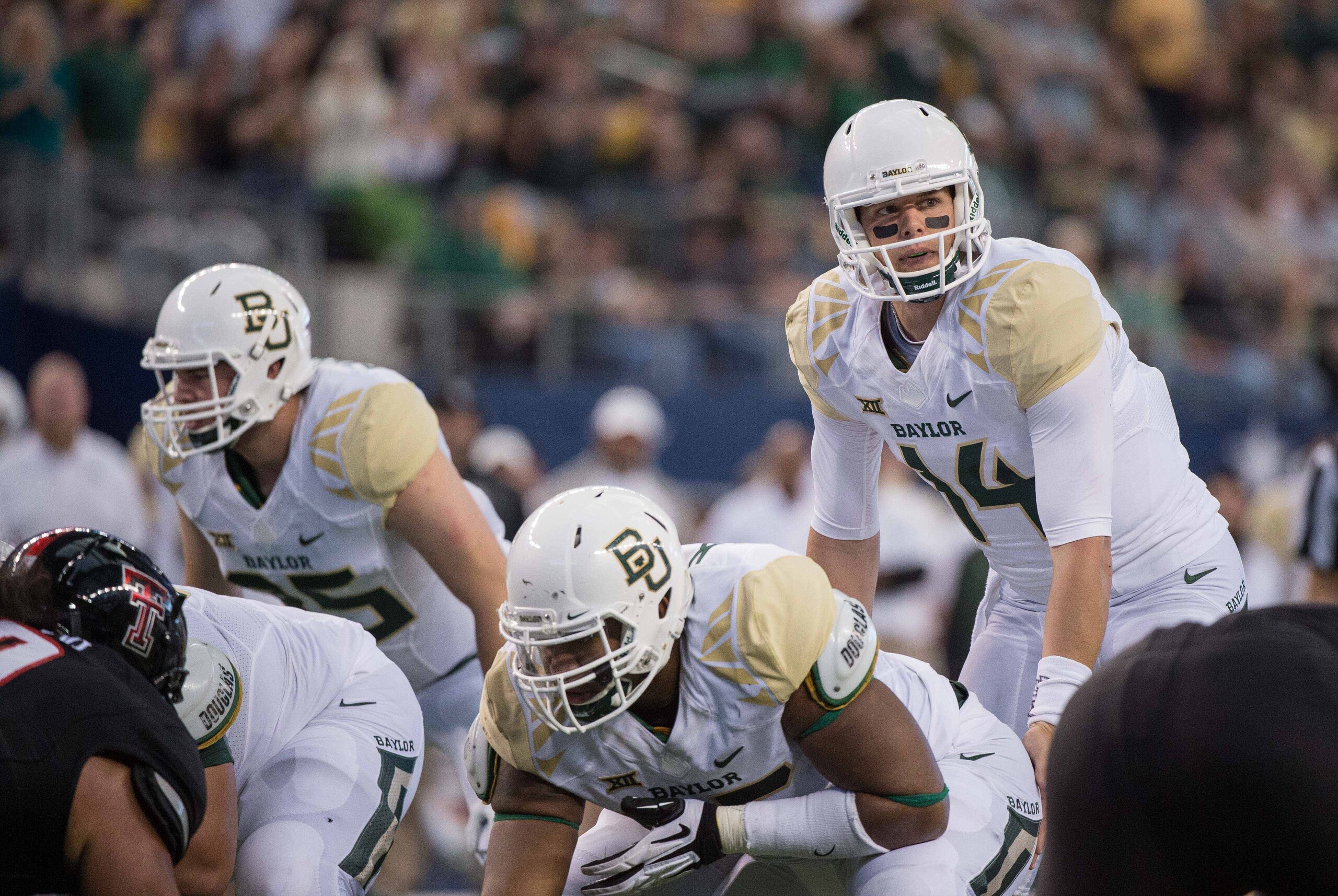 Nov 29, 2014; Arlington, TX, USA; Baylor Bears quarterback Bryce Petty (14) during the game against the Texas Tech Red Raiders at AT&T Stadium. The Bears defeated the Red Raiders 48-46. Mandatory Credit: Jerome Miron-USA TODAY Sports