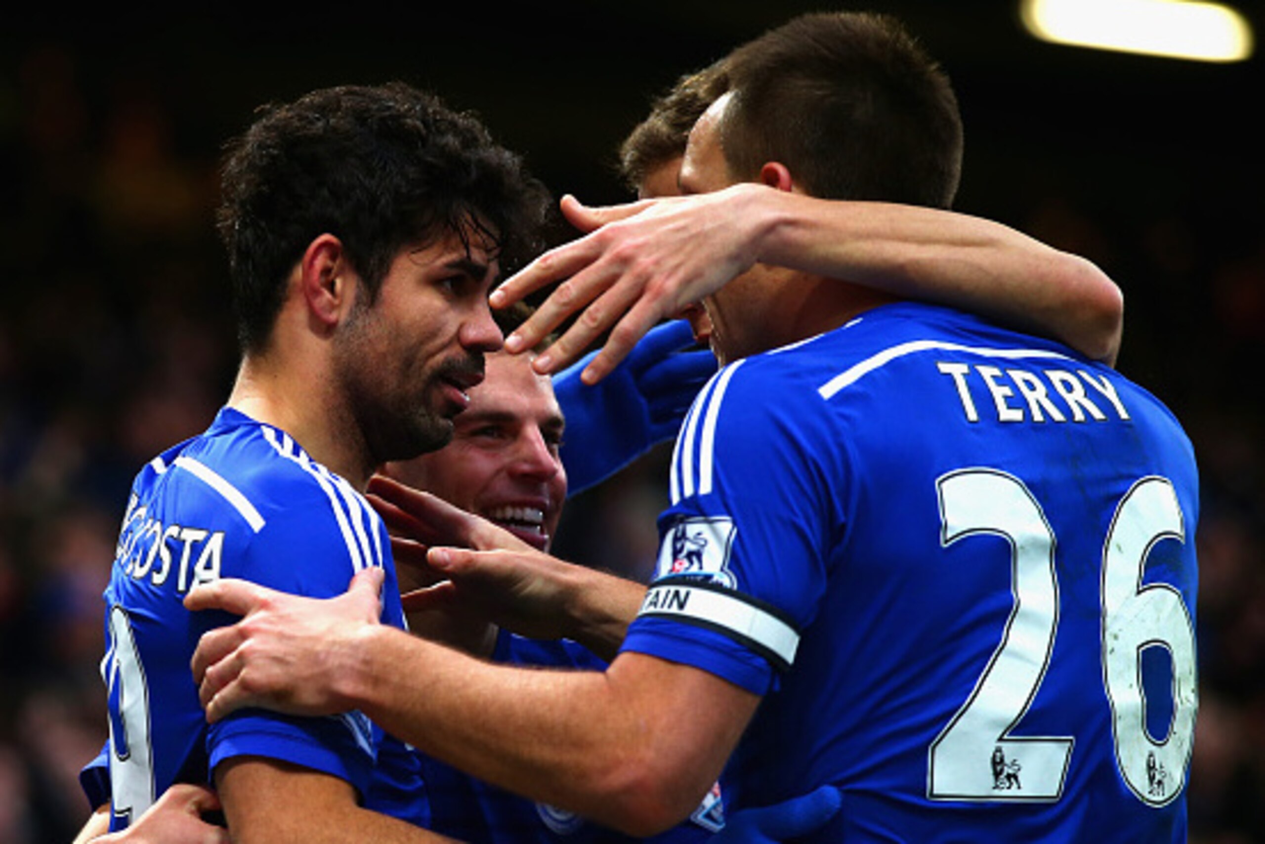 LONDON, ENGLAND - DECEMBER 26:  Diego Costa of Chelsea celebrates scoring their second goal with team mates during the Barclays Premier League match between Chelsea and West Ham United at Stamford Bridge on December 26, 2014 in London, England.  (Photo by