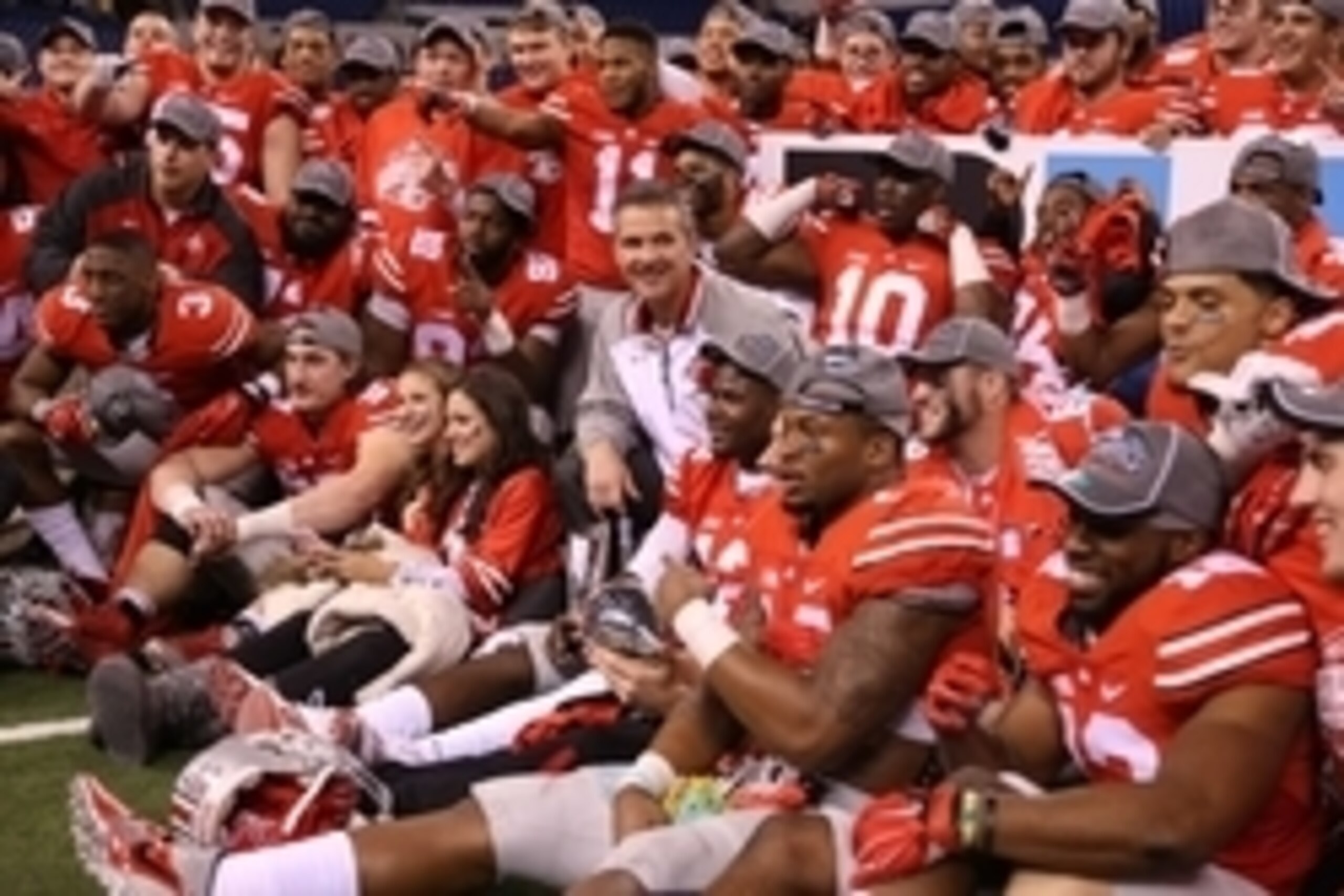 Dec 6, 2014; Indianapolis, IN, USA; Ohio State Buckeyes coach Urban Meyer poses in a team photo after the game against the Wisconsin Badgers during the Big Ten Football Championship game at Lucas Oil Stadium. Ohio State defeats Wisconsin 59-0. Mandatory C