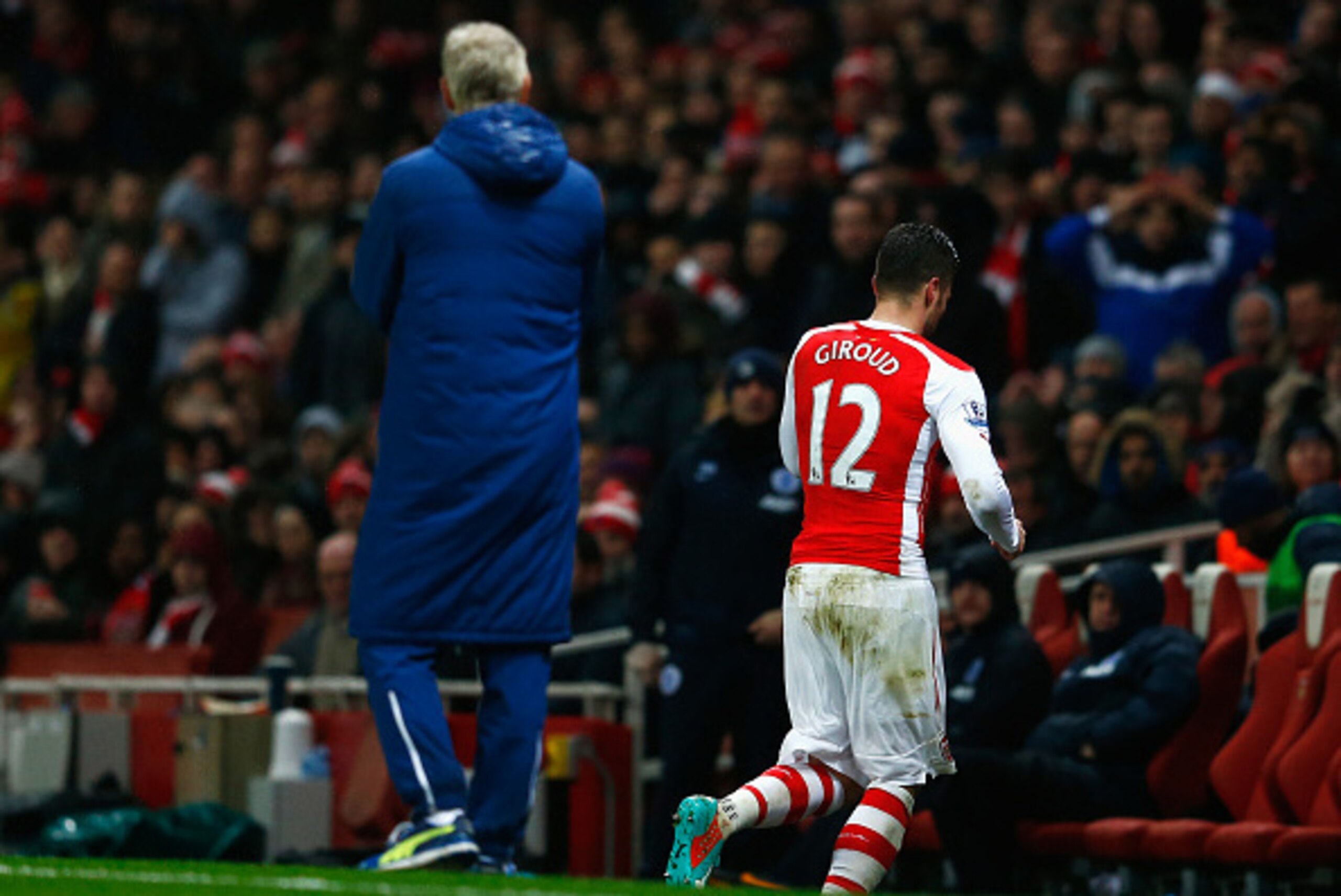 LONDON, ENGLAND - DECEMBER 26: Olivier Giroud of Arsenal leaves the field after being sent off for a head butt on Nedum Onuoha of QPR during the Barclays Premier League match between Arsenal and Queens Park Rangers at Emirates Stadium on December 26, 201 LONDON, ENGLAND - DECEMBER 26: Olivier Giroud of Arsenal leaves the field after being sent off for a head butt on Nedum Onuoha of QPR during the Barclays Premier League match between Arsenal and Queens Park Rangers at Emirates Stadium on December 26, 201