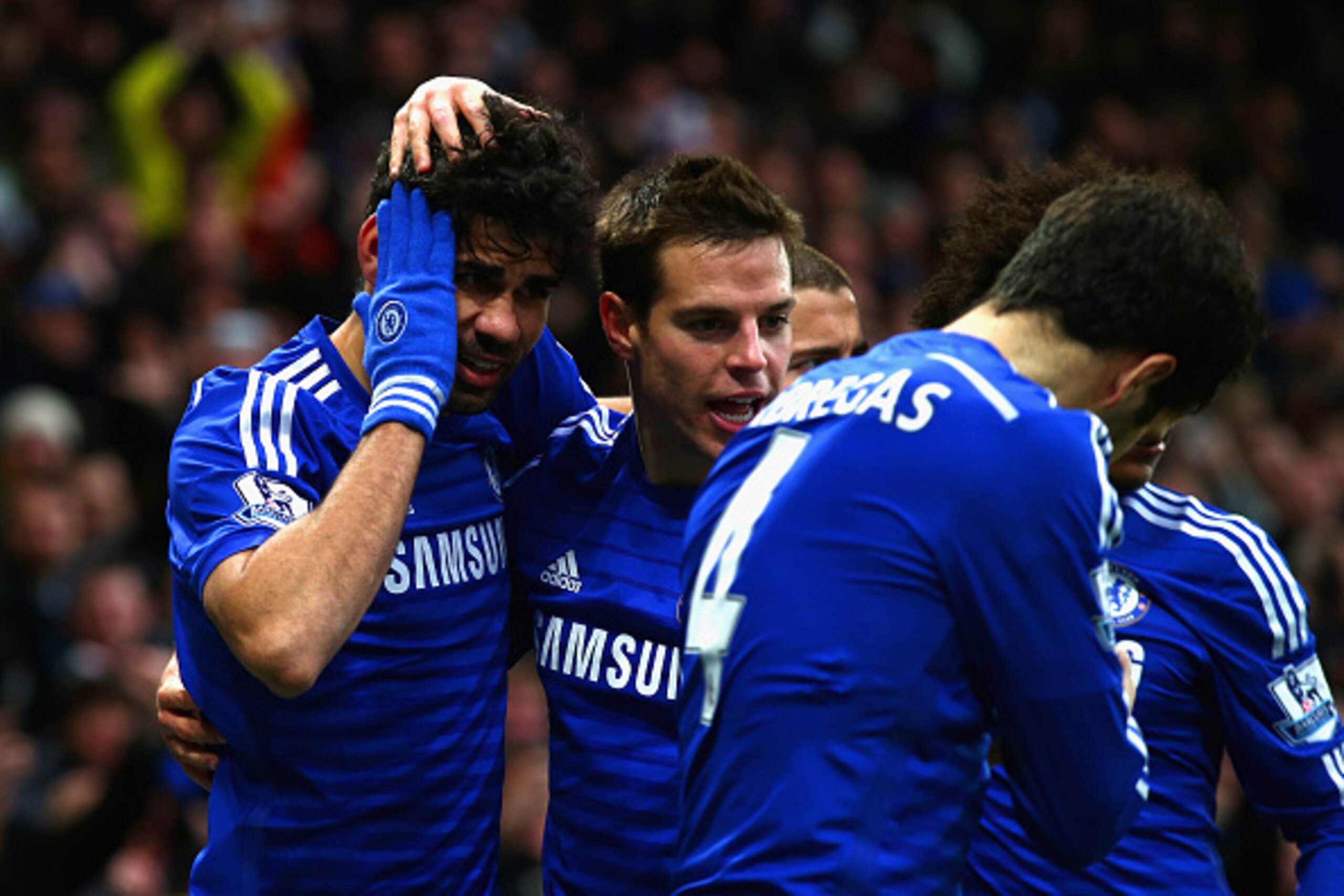 LONDON, ENGLAND - DECEMBER 26: Diego Costa of Chelsea celebrates scoring their second goal with Cesar Azpilicueta of Chelsea during the Barclays Premier League match between Chelsea and West Ham United at Stamford Bridge on December 26, 2014 in London, LONDON, ENGLAND - DECEMBER 26: Diego Costa of Chelsea celebrates scoring their second goal with Cesar Azpilicueta of Chelsea during the Barclays Premier League match between Chelsea and West Ham United at Stamford Bridge on December 26, 2014 in London,