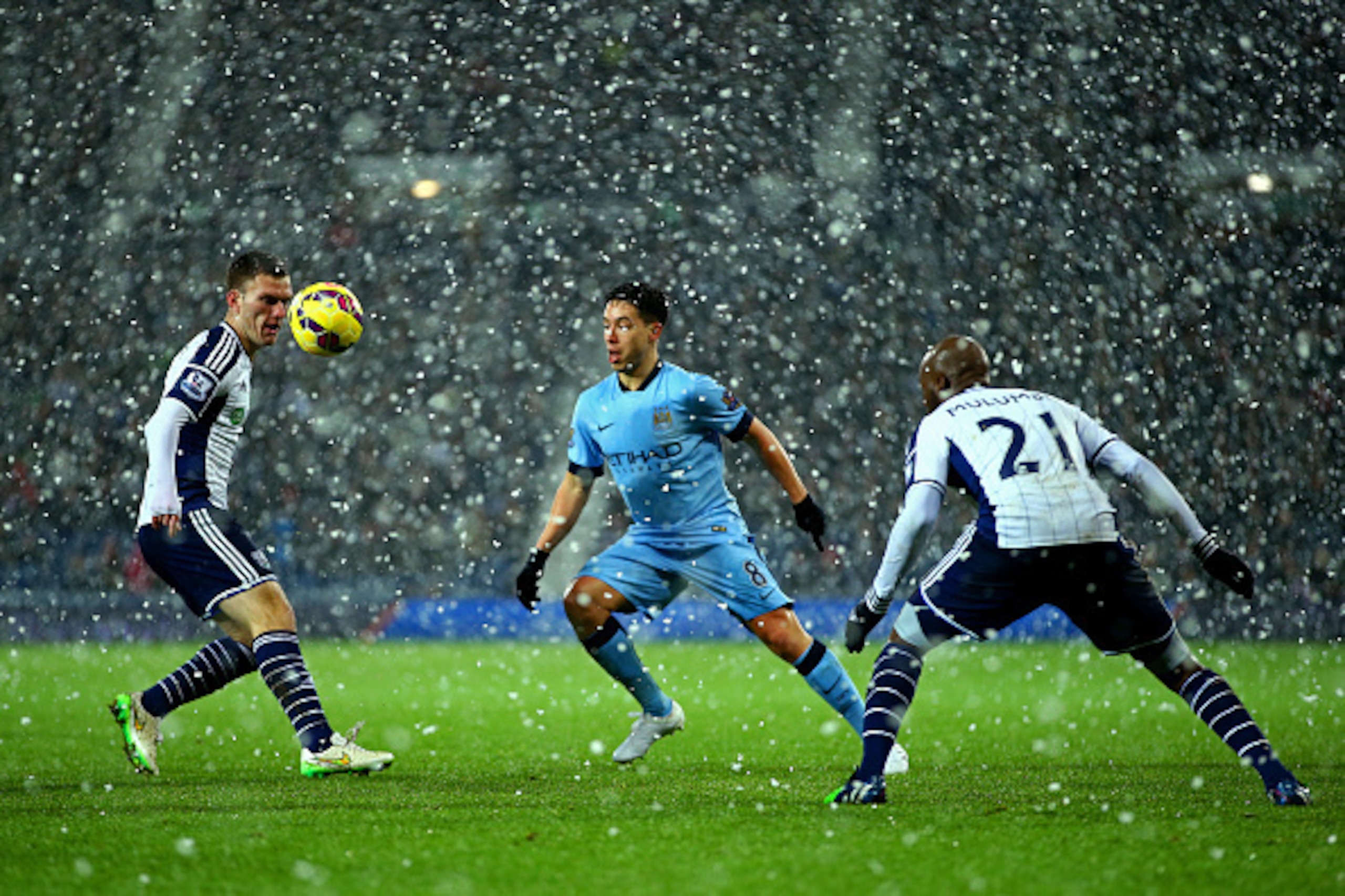 WEST BROMWICH, ENGLAND - DECEMBER 26: Samir Nasri of Manchester City battles for the ball with Craig Gardner of West Brom during the Barclays Premier League match between West Bromwich Albion and Manchester City at The Hawthorns on December 26, 2014 in W WEST BROMWICH, ENGLAND - DECEMBER 26: Samir Nasri of Manchester City battles for the ball with Craig Gardner of West Brom during the Barclays Premier League match between West Bromwich Albion and Manchester City at The Hawthorns on December 26, 2014 in W