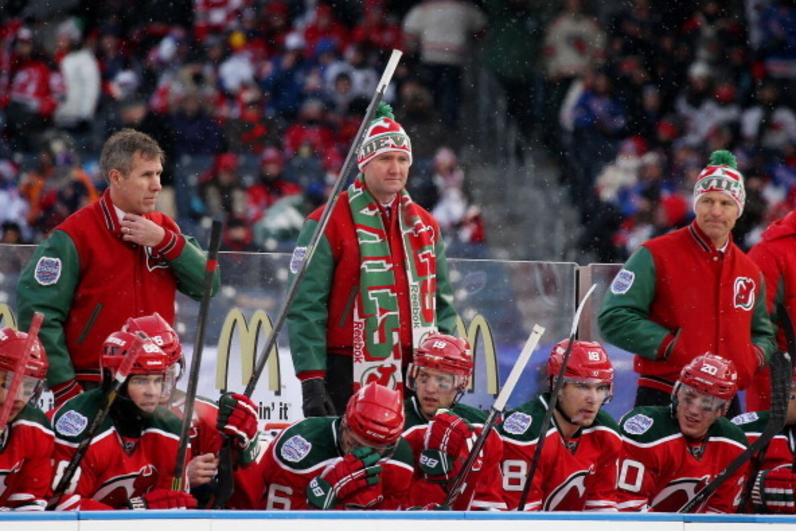 NEW YORK, NY - JANUARY 26:  (EDITORIAL USE ONLY) Head coach Peter DeBoer (C) of the New Jersey Devils looks on during the 2014 Coors Light NHL Stadium Series at Yankee Stadium on January 26, 2014 in the Bronx borough of New York City.  (Photo by Bruce Ben