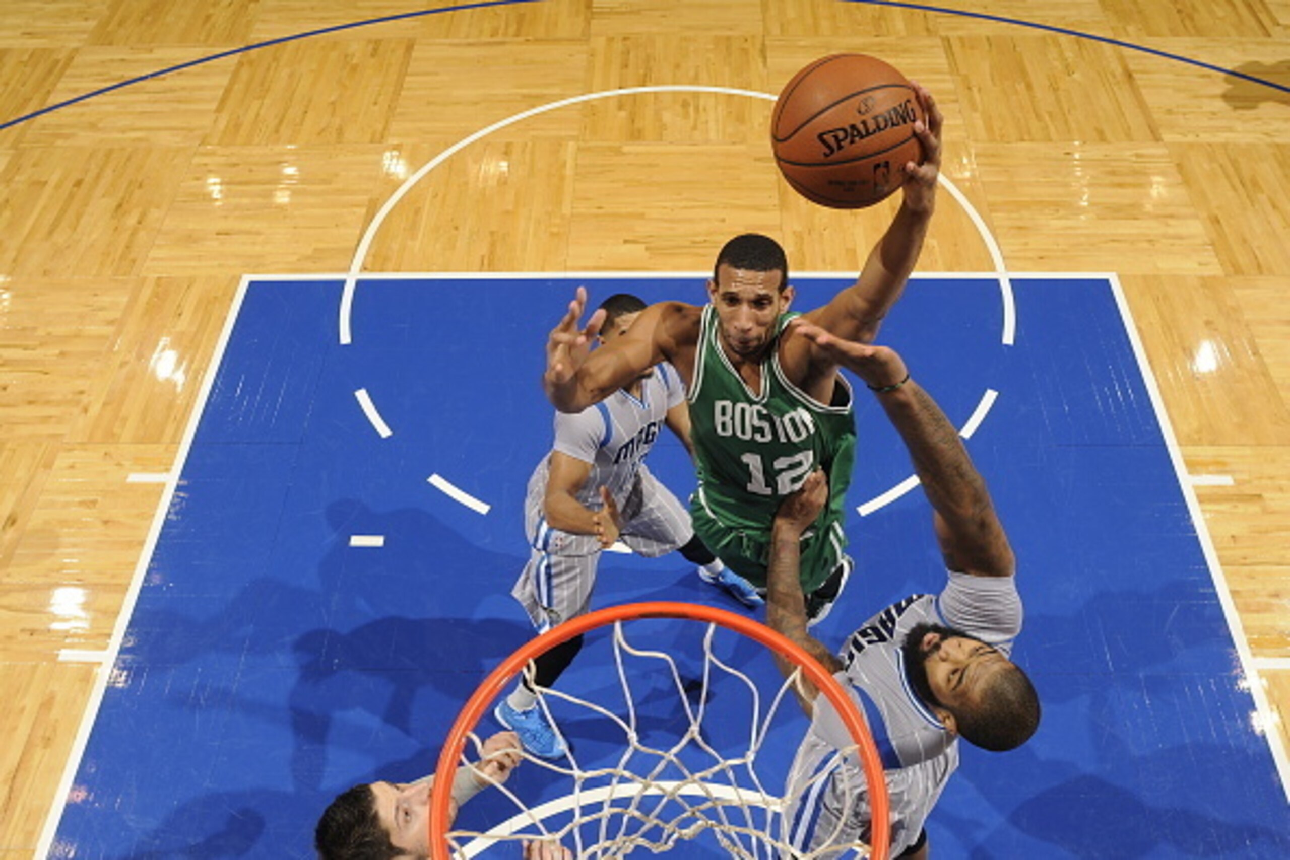 ORLANDO, FL - DECEMBER 23:  Brandan Wright #12 of the Boston Celtics goes to the basket against the Orlando Magic on December 23, 2014 at Amway Center in Orlando, Florida. NOTE TO USER: User expressly acknowledges and agrees that, by downloading and or us