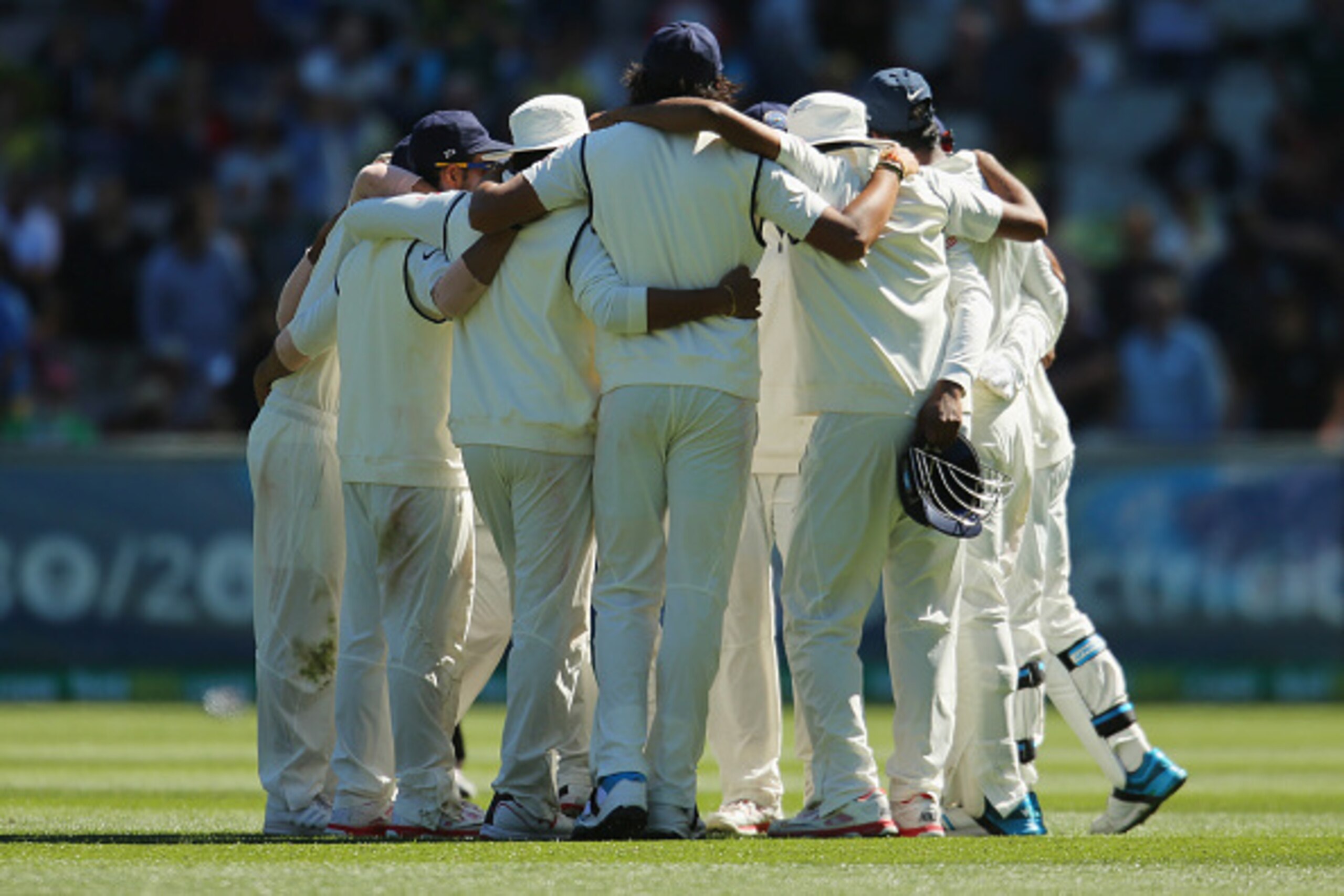 MELBOURNE, AUSTRALIA - DECEMBER 26:  India form a huddle after the tea break during day one of the Third Test match between Australia and India at Melbourne Cricket Ground on December 26, 2014 in Melbourne, Australia.  (Photo by Scott Barbour/Getty Images